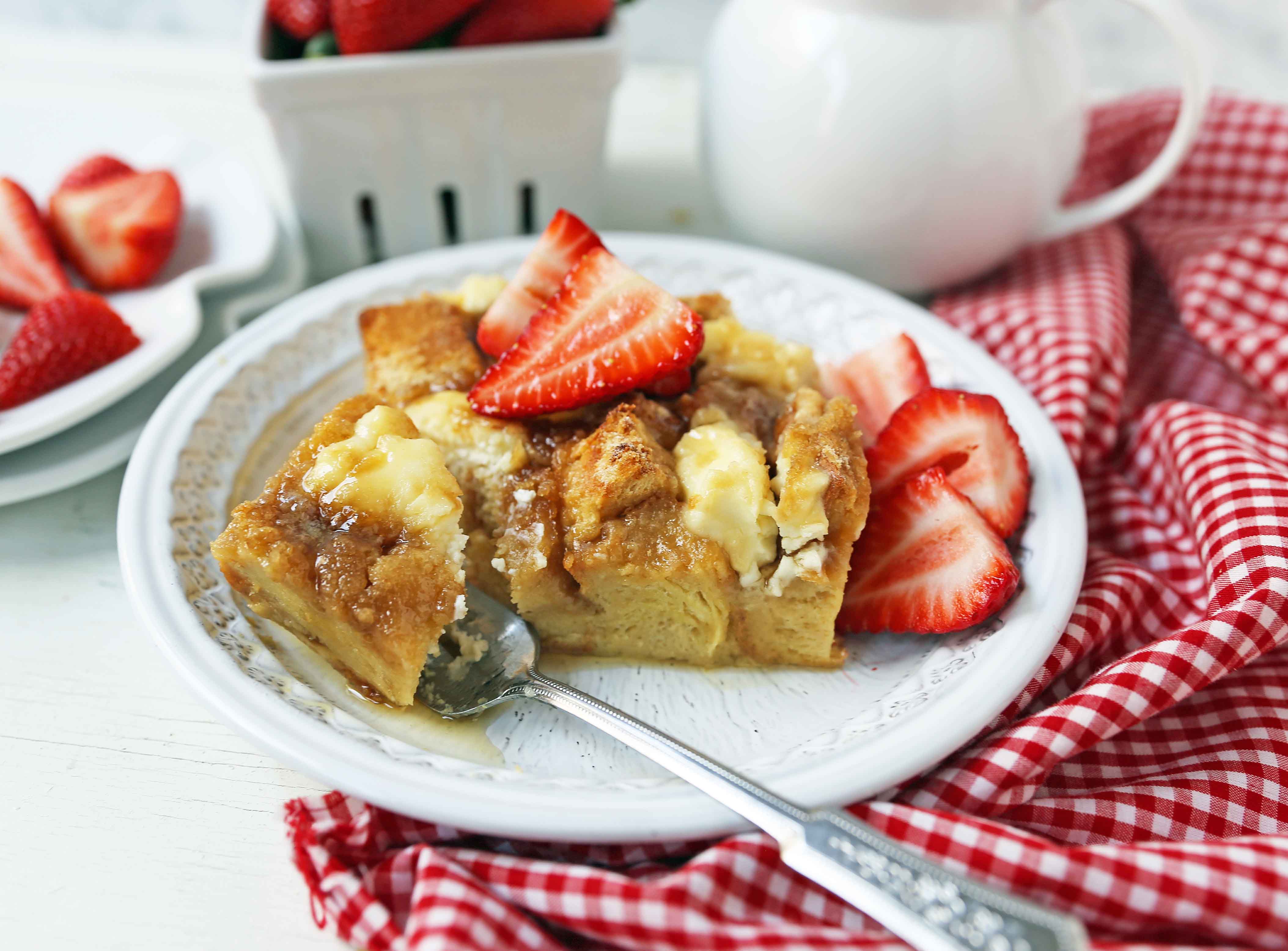 Baked French Toast Casserole. Challah bread soaked in a rich sweet custard with sweet cream cheese and topped with a brown sugar streusel topping. An easy overnight french toast recipe. www.modernhoney.com #frenchtoast #bakedfrenchtoast #breakfast #overnightfrenchtoast