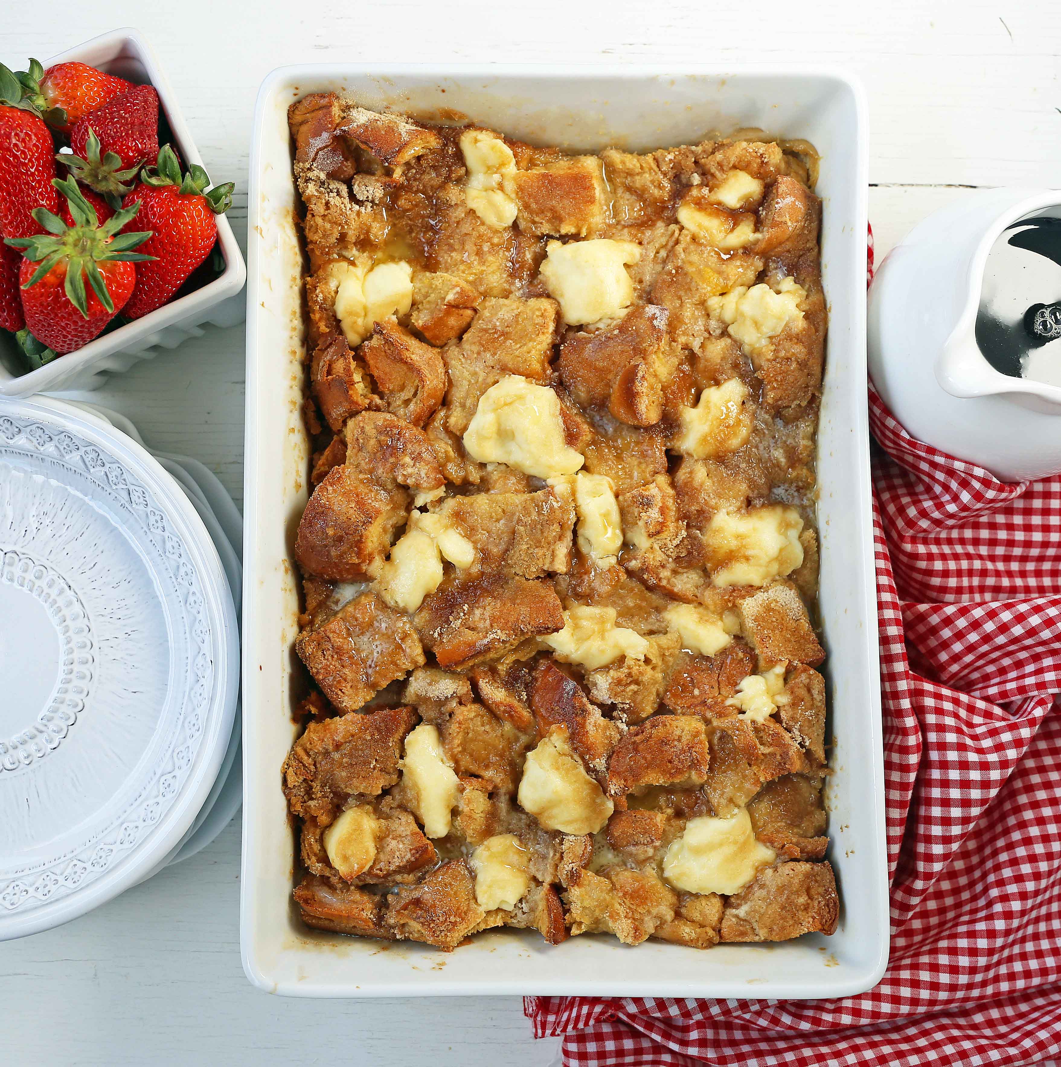 Baked French Toast Casserole. Challah bread soaked in a rich sweet custard with sweet cream cheese and topped with a brown sugar streusel topping. An easy overnight french toast recipe. www.modernhoney.com #frenchtoast #bakedfrenchtoast #breakfast #overnightfrenchtoast