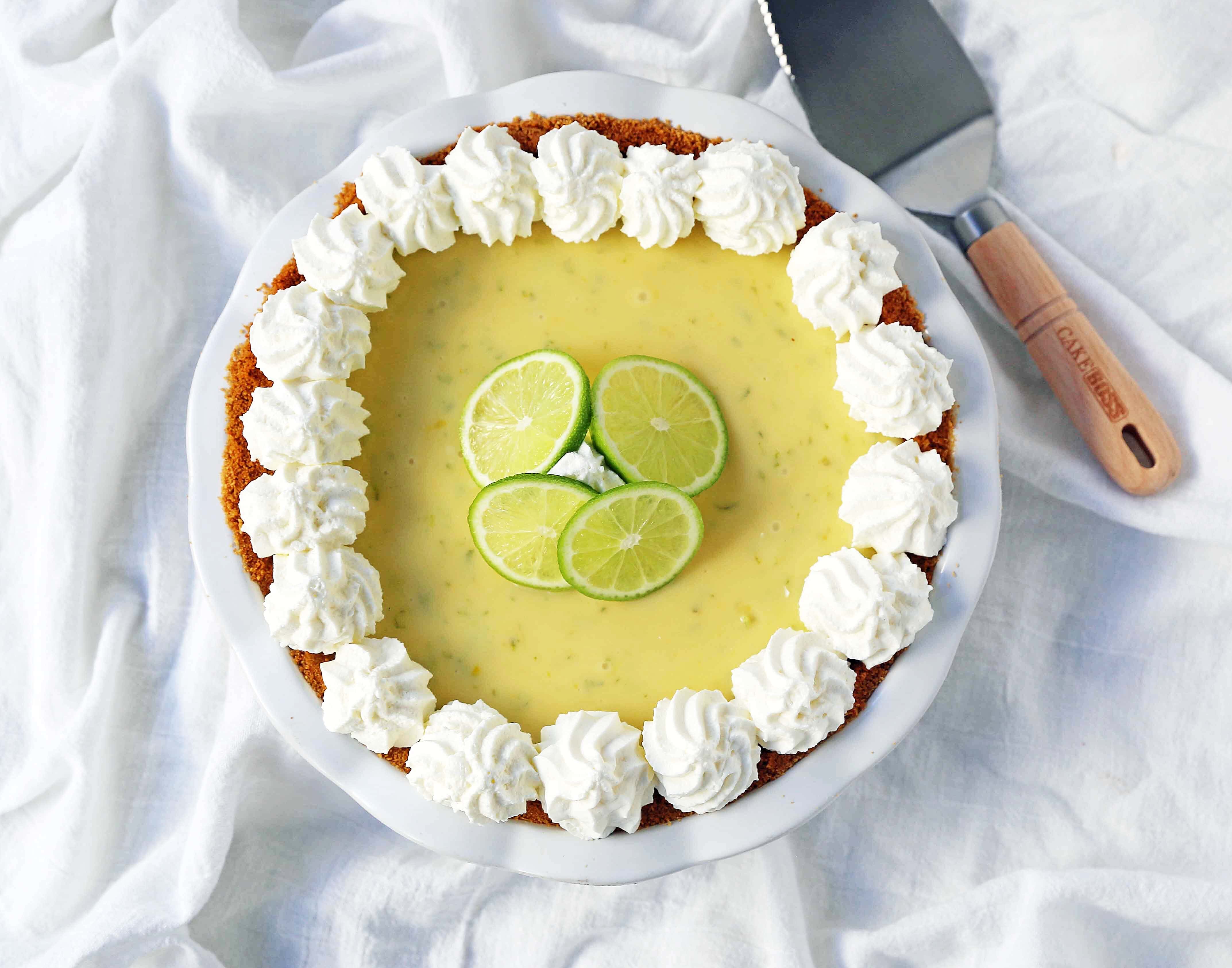 Key Lime Pie. The best creamy key lime pie in a buttery graham cracker crust with fresh sweetened whipped cream. www.modernhoney.com #keylimepie #limepie #pie #easterdesserts