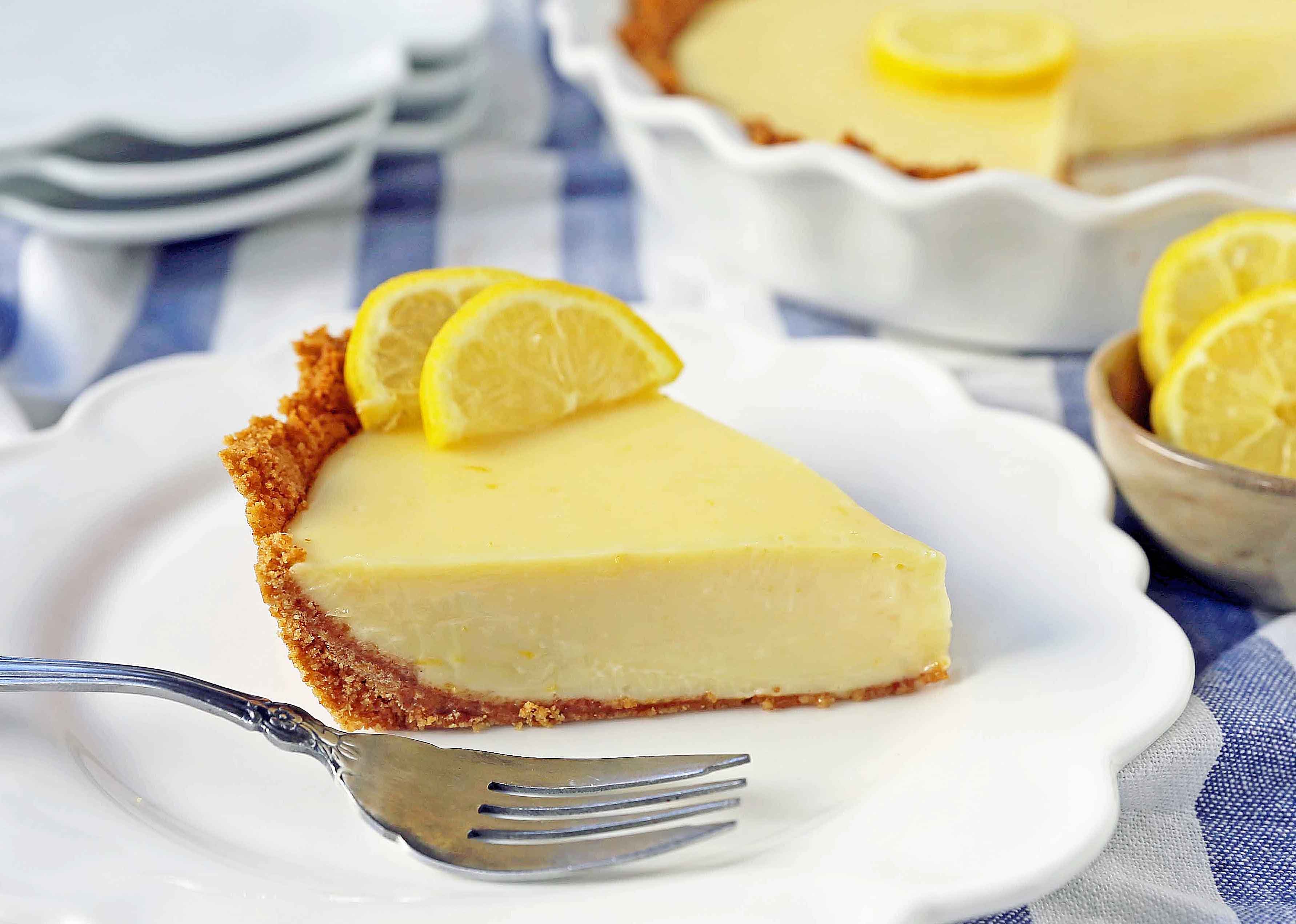 Lemon Cream Pie. A simple creamy lemon cream pie with fresh lemon zest in a buttery graham cracker crust with sweetened whipped cream. The BEST Lemon Pie Recipe. www.modernhoney.com #lemonpie #lemoncreampie #lemonpierecipe