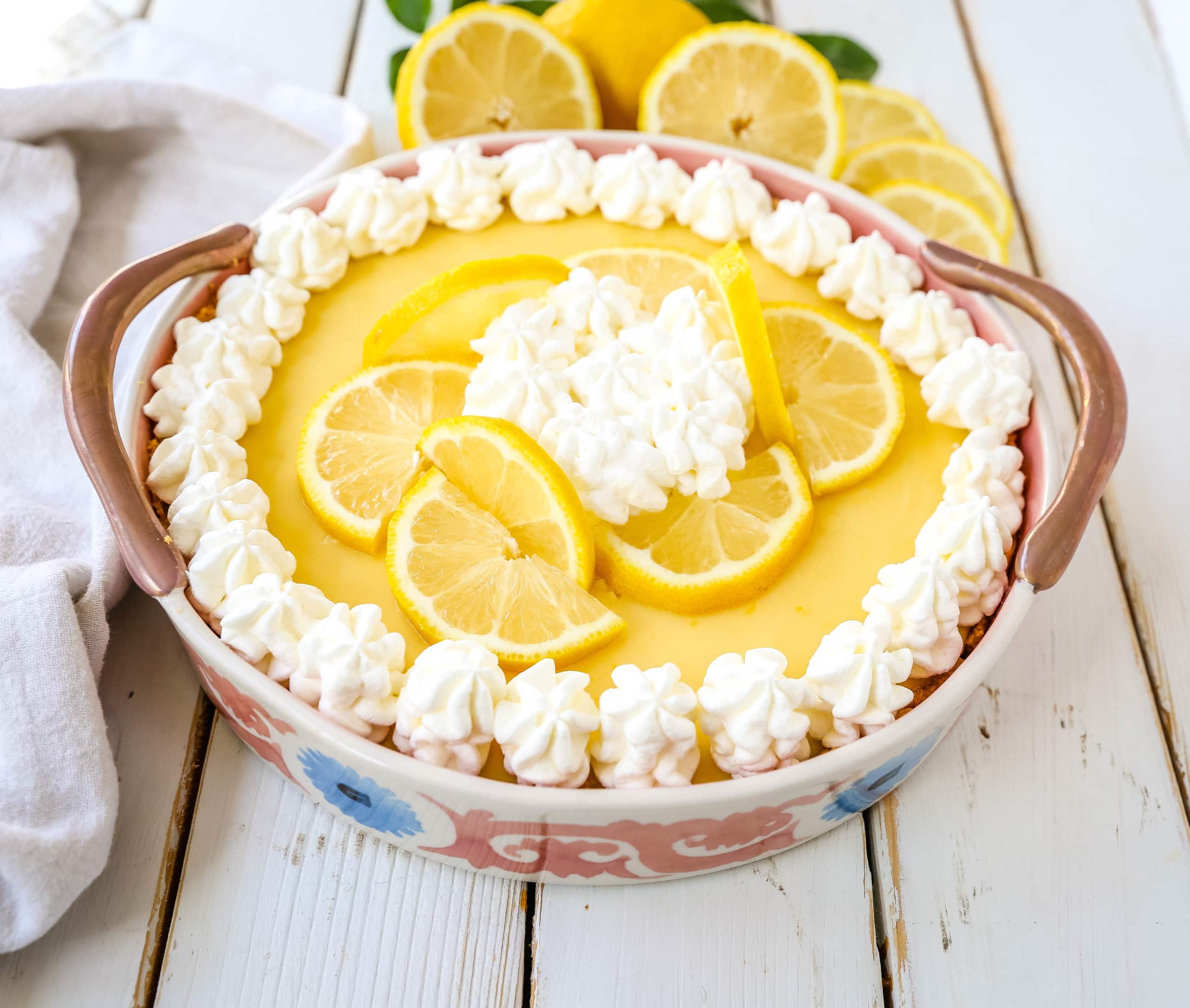 Lemon Cream Pie  A simple creamy lemon cream pie with fresh lemon zest in a buttery graham cracker crust with sweetened whipped cream. The best lemon cream pie recipe! www.modernhoney.com #lemonpie #lemoncreampie #lemon #dessert #pie