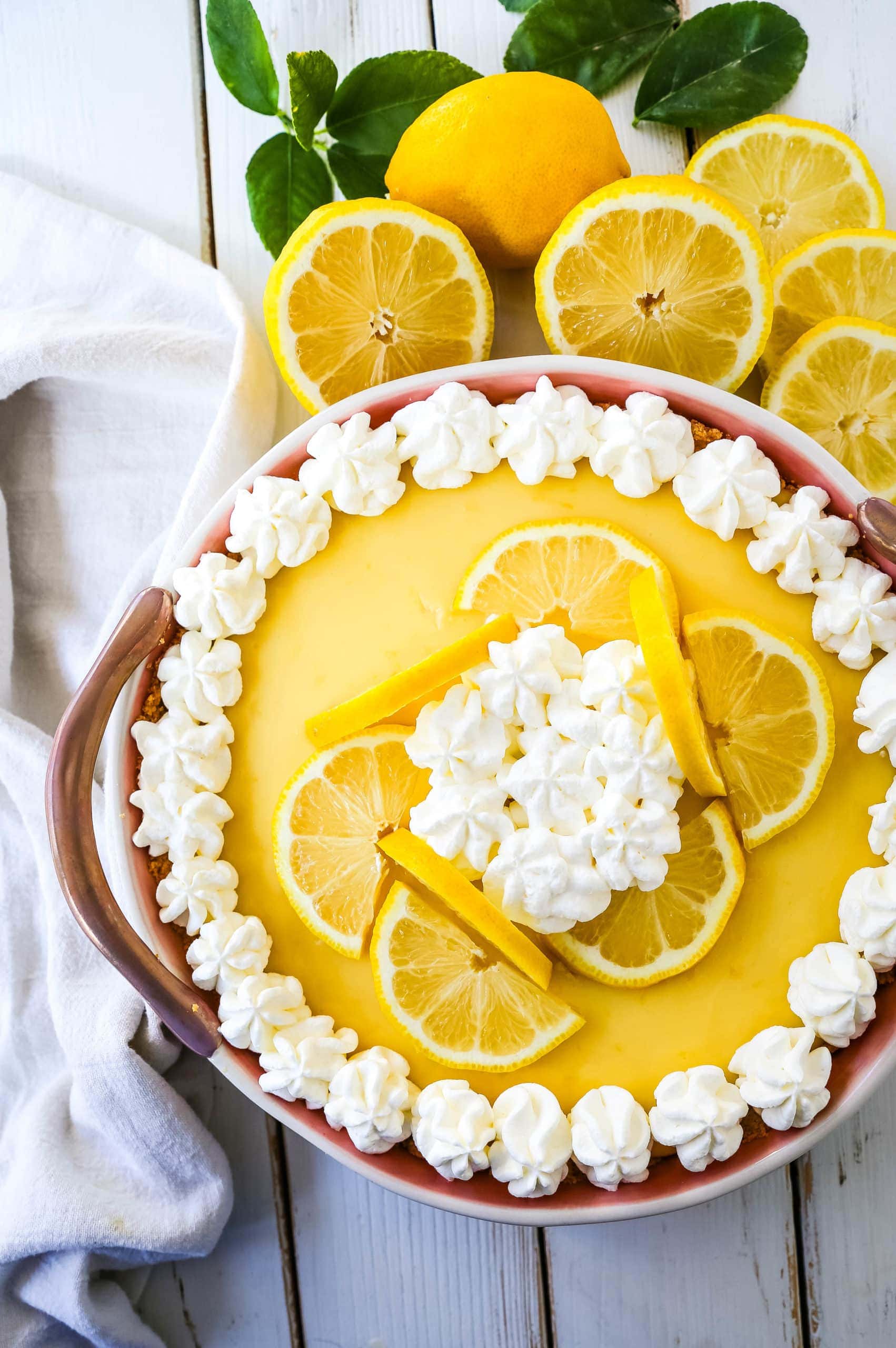 Lemon Cream Pie  A simple creamy lemon cream pie with fresh lemon zest in a buttery graham cracker crust with sweetened whipped cream. The best lemon cream pie recipe! www.modernhoney.com #lemonpie #lemoncreampie #lemon #dessert #pie