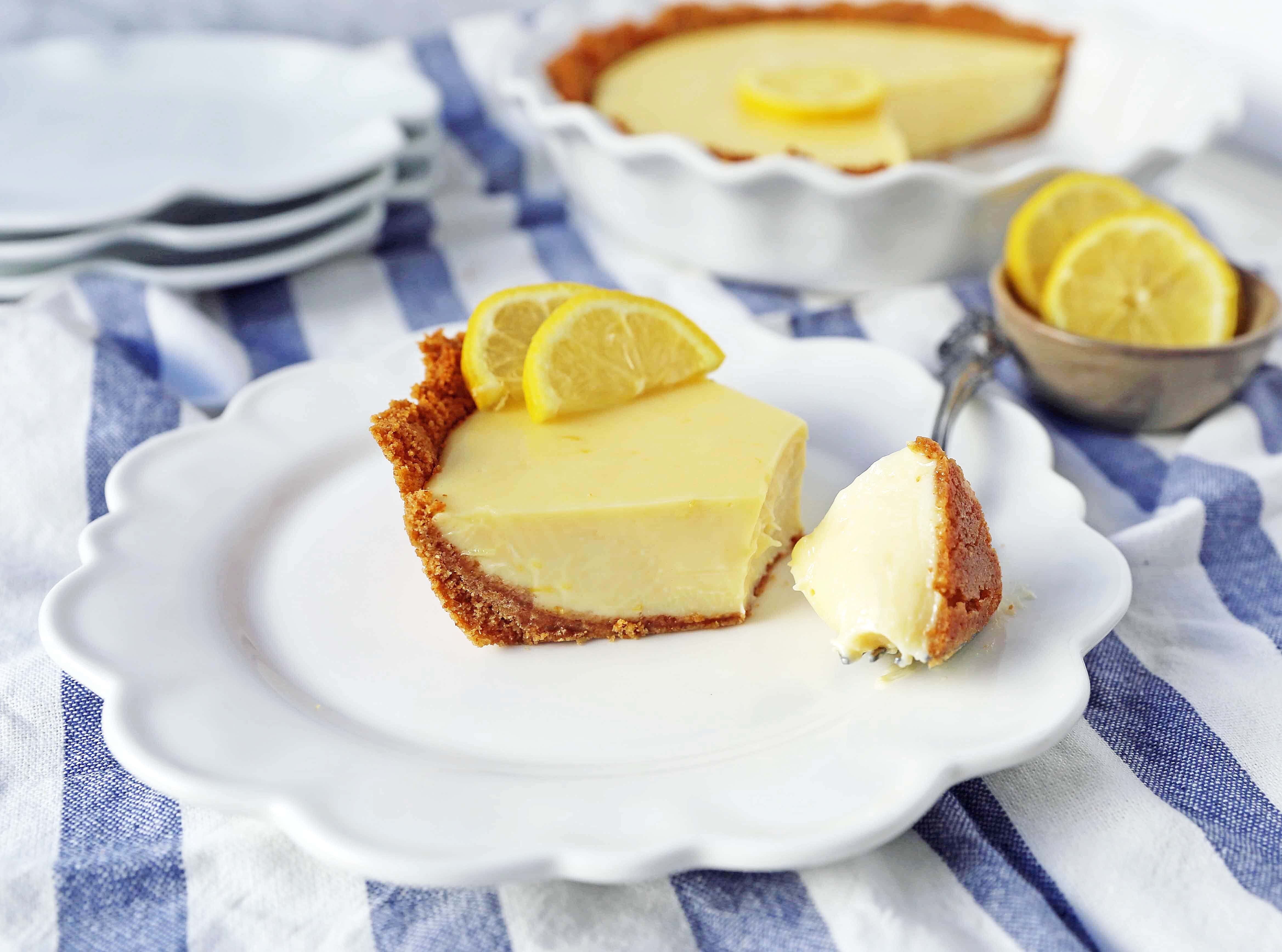 Lemon Cream Pie. A simple creamy lemon cream pie with fresh lemon zest in a buttery graham cracker crust with sweetened whipped cream. The BEST Lemon Pie Recipe. www.modernhoney.com #lemonpie #lemoncreampie #lemonpierecipe