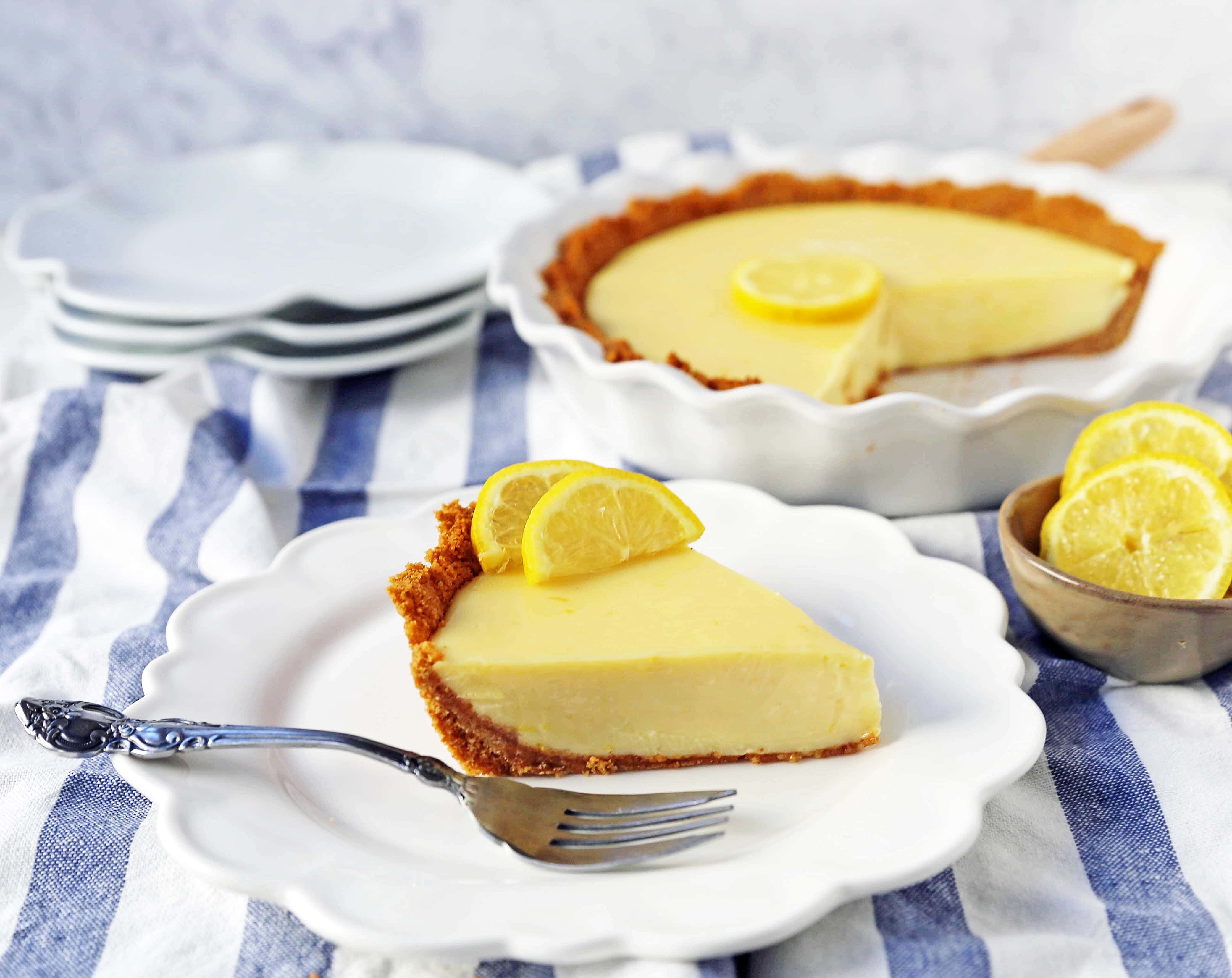 Lemon Cream Pie. A simple creamy lemon cream pie with fresh lemon zest in a buttery graham cracker crust with sweetened whipped cream. The BEST Lemon Pie Recipe. www.modernhoney.com #lemonpie #lemoncreampie #lemonpierecipe