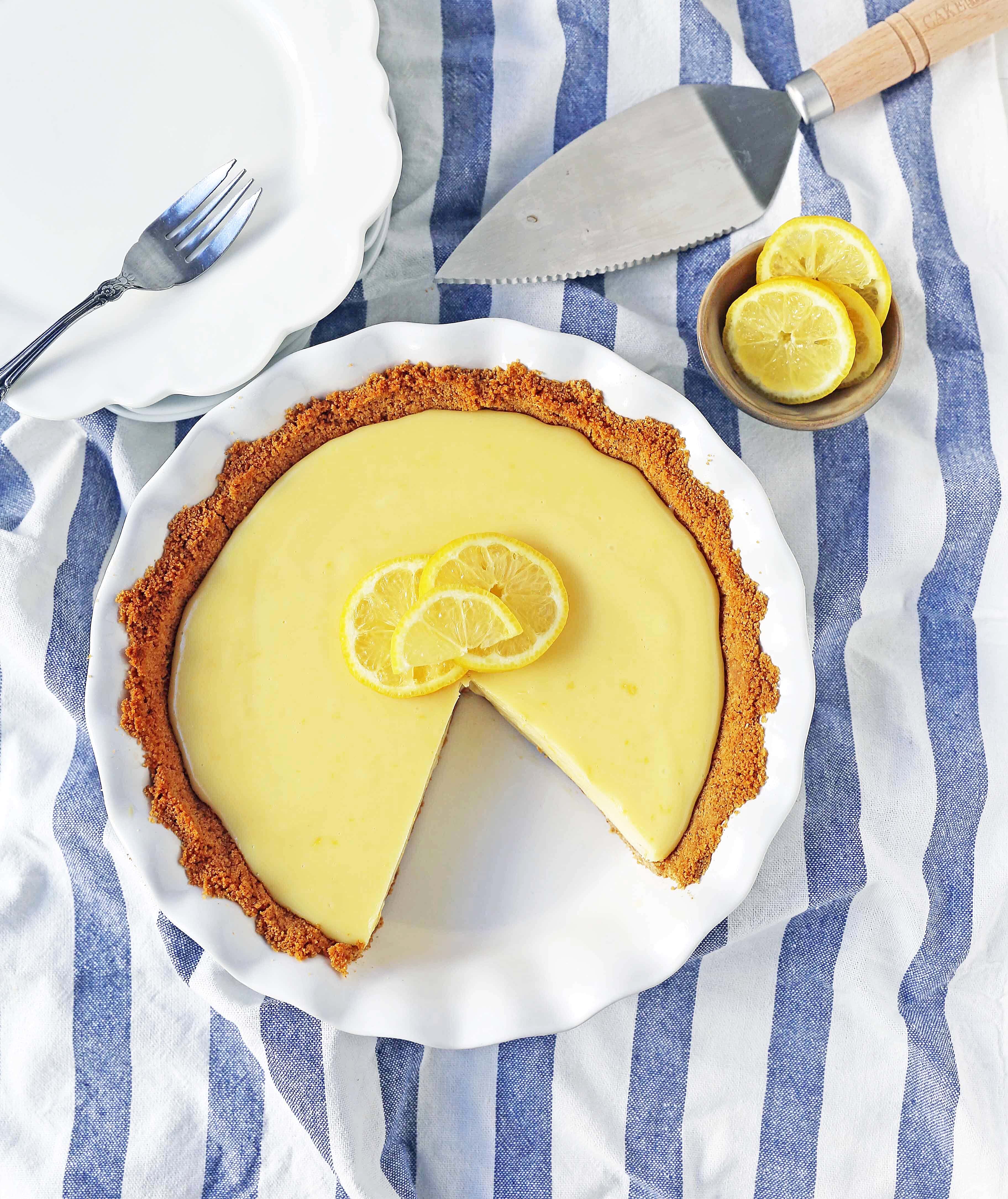 Lemon Cream Pie. A simple creamy lemon cream pie with fresh lemon zest in a buttery graham cracker crust with sweetened whipped cream. The BEST Lemon Pie Recipe. www.modernhoney.com #lemonpie #lemoncreampie #lemonpierecipe