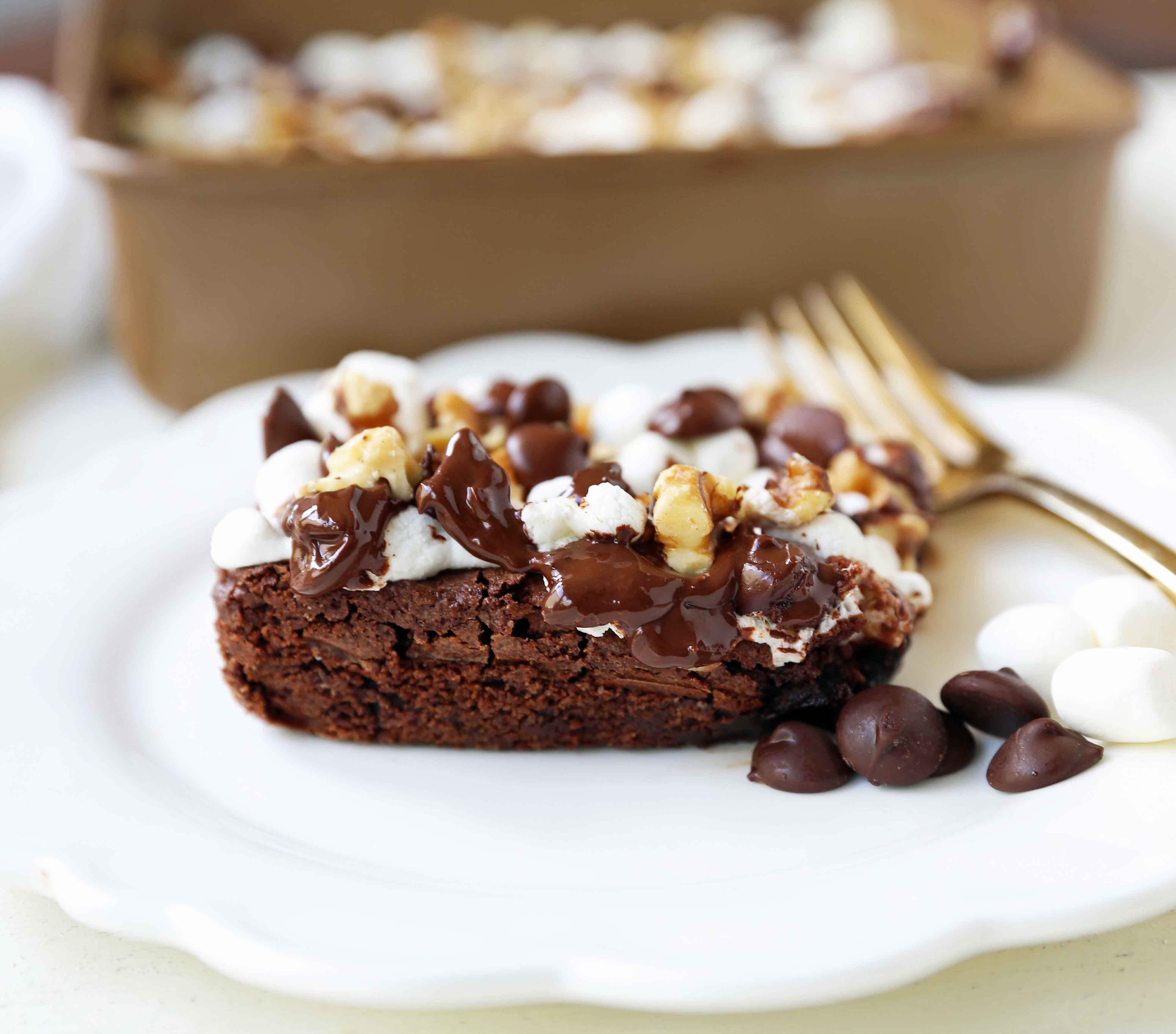 Rocky Road Brownies. Homemade decadent chocolate brownies topped with melted marshmallows, chocolate chips, and walnuts. A classic brownie! www.modernhoney.com #rockyroad #rockyroadbrownies #gourmetbrownies