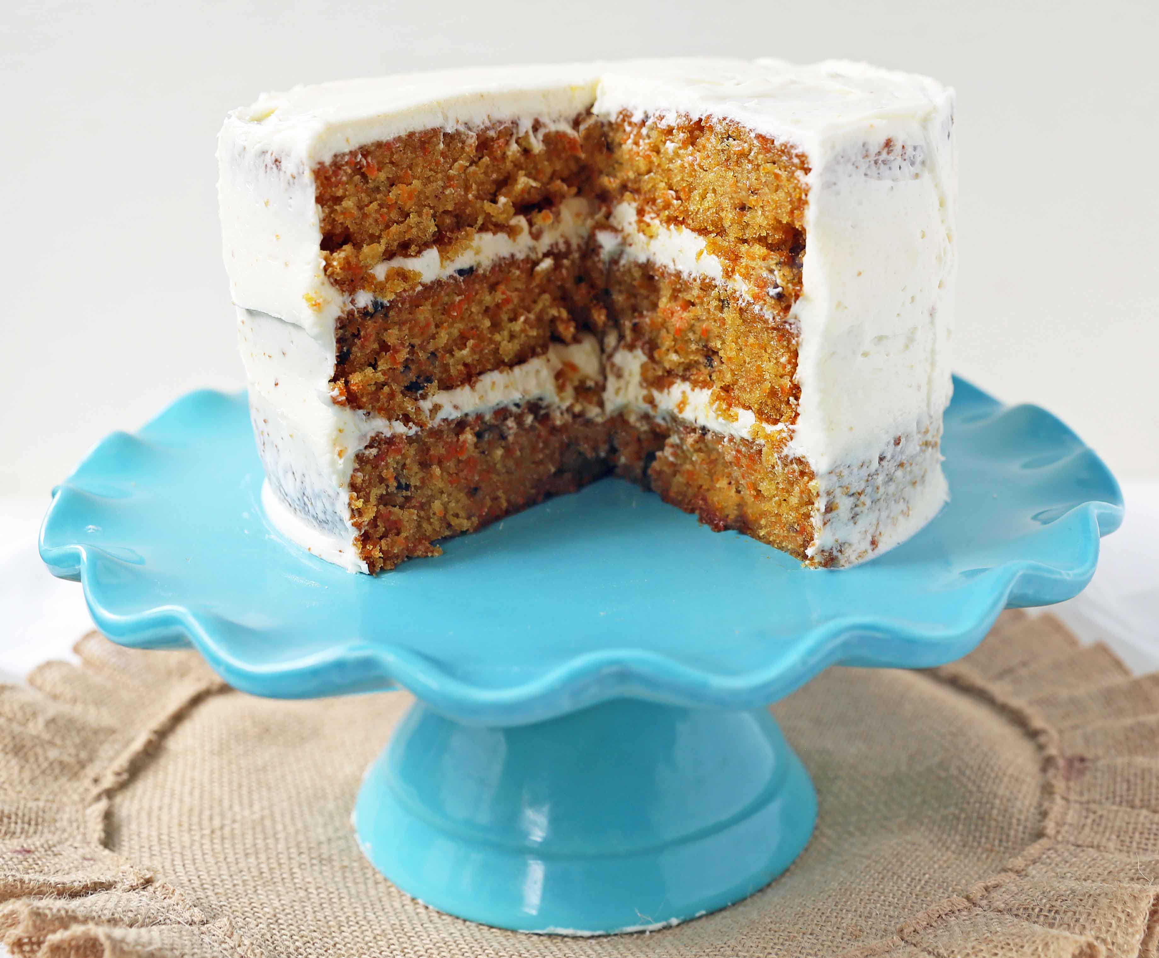 The Best Carrot Cake Recipe. A moist, tender carrot cake covered in a sweet cream cheese frosting. The perfect carrot cake recipe! #carrotcake #carrotcakerecipe #easter #easterrecipes