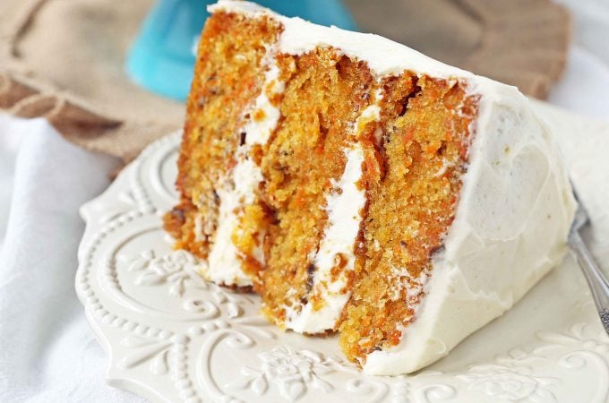 The Best Carrot Cake Recipe. A moist, tender carrot cake covered in a sweet cream cheese frosting. The perfect carrot cake recipe! #carrotcake #carrotcakerecipe #easter #easterrecipes