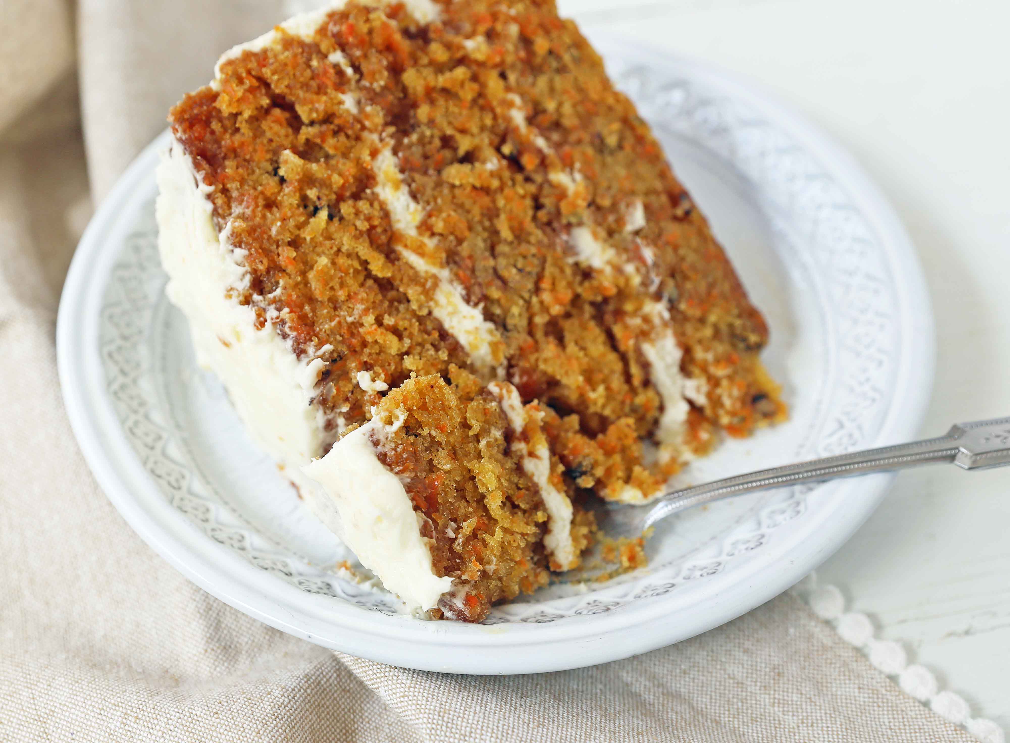 The Best Carrot Cake Recipe. A moist, tender carrot cake covered in a sweet cream cheese frosting. The perfect carrot cake recipe! #carrotcake #carrotcakerecipe #easter #easterrecipes