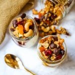 Chocolate Coconut Granola. A decadent chocolate coconut granola with cashews, dried cranberries, apricots, almonds, coconut flakes, and chocolate chips. The best Chocolate Coconut Granola Recipe. www.modernhoney.com #granola #chocolatecoconutgranola #granolarecipe