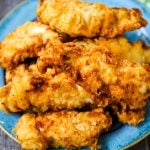 Fried Chicken Tenders Juicy, tender, marinated chicken dipped in coating and fried until perfectly crispy. The best fried chicken tenders recipe! www.modernhoney.com #chicken #chickentenders #friedchicken #friedchickentenders