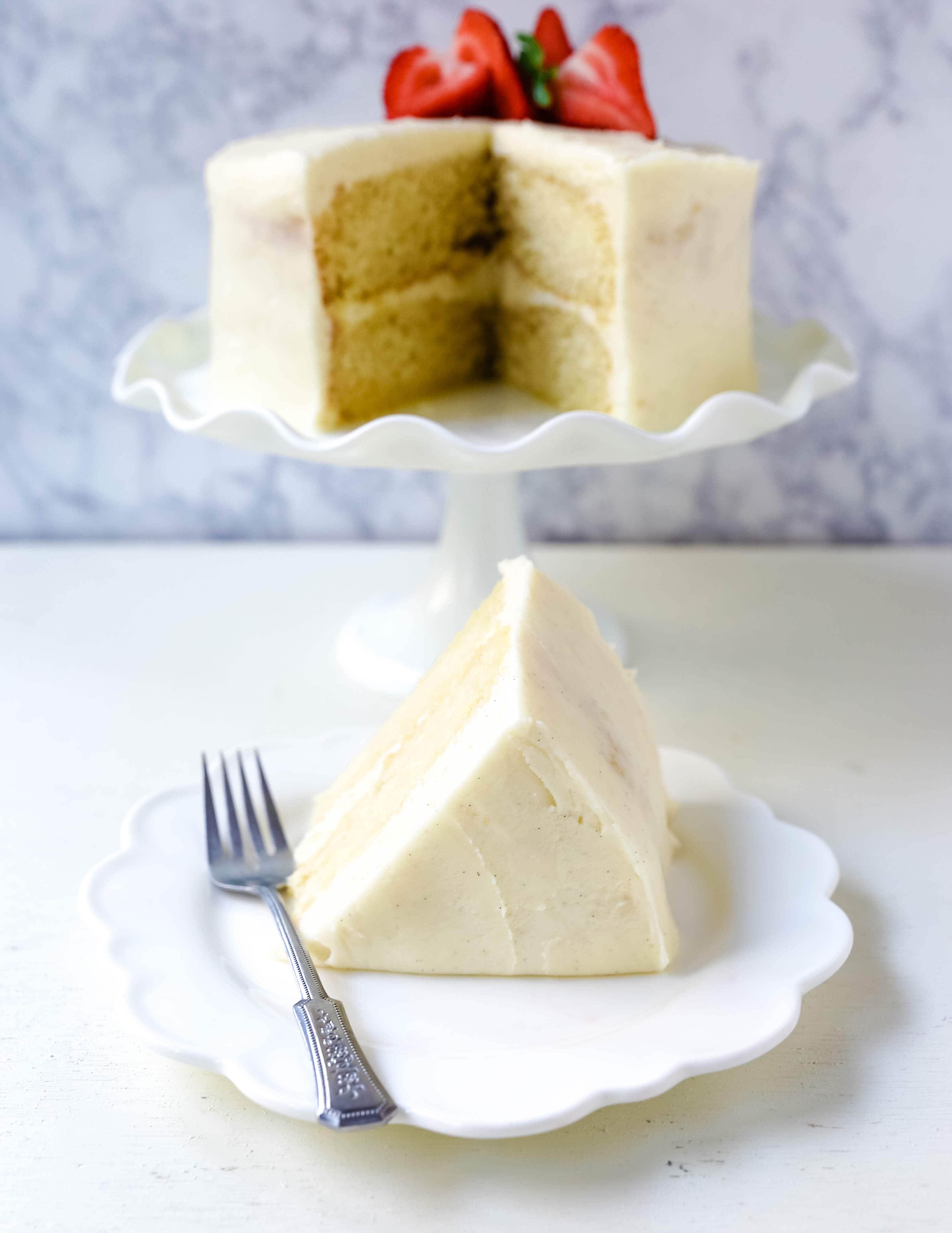 Vanilla Cake Recipe. The best homemade vanilla cake recipe with vanilla bean buttercream frosting. www.modernhoney.com #vanillacake #cake #cakerecipe #vanillacakerecipe