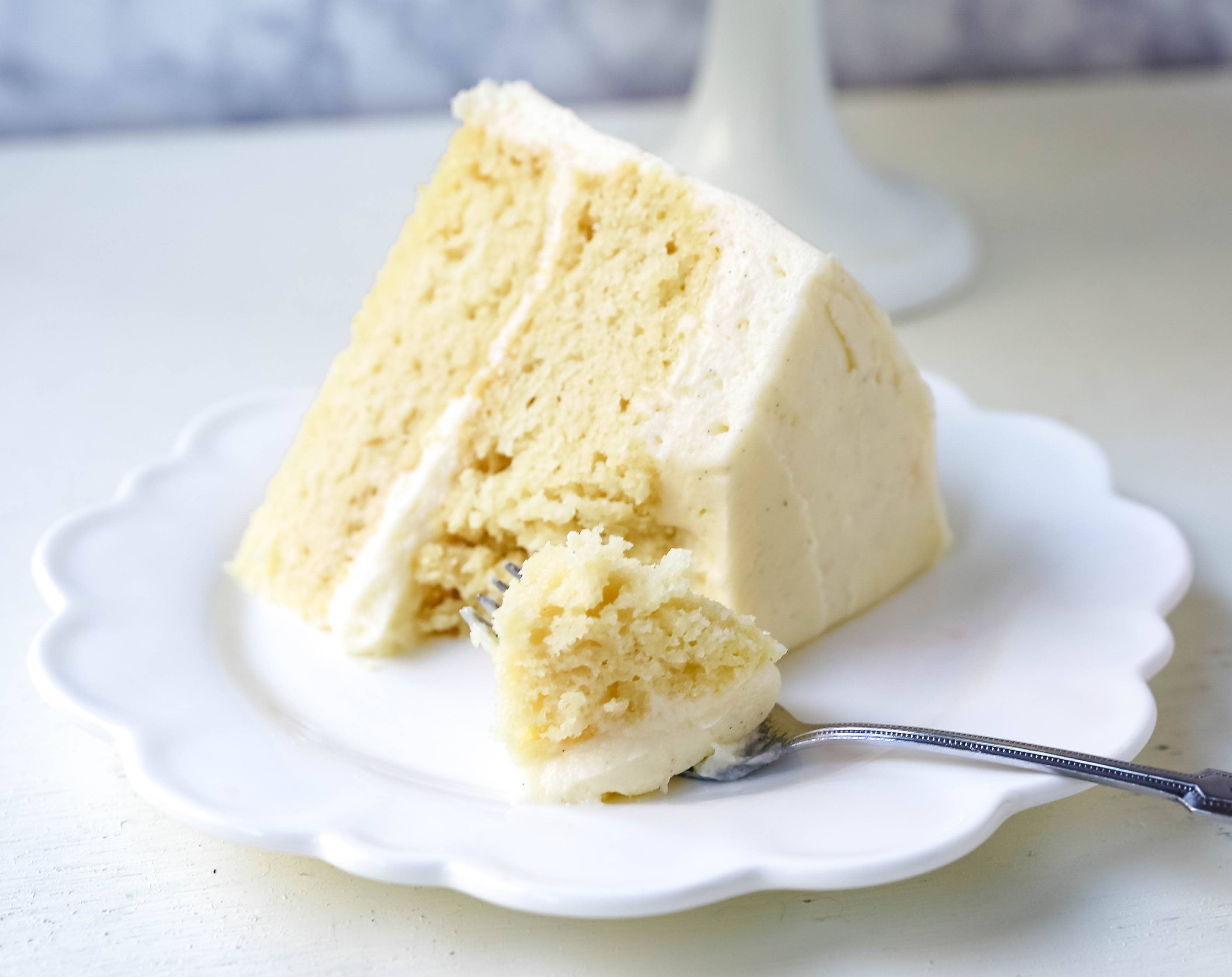 Vanilla Cake Recipe. The best homemade vanilla cake recipe with vanilla bean buttercream frosting. www.modernhoney.com #vanillacake #cake #cakerecipe #vanillacakerecipe