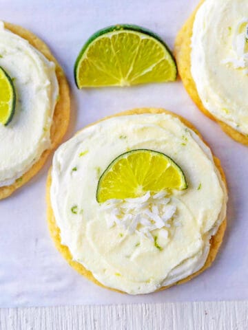Chewy lime cookies with creamy coconut lime frosting. This frosted lime sugar cookie will be a favorite in the summer. The perfect tropical Caribbean cookie!