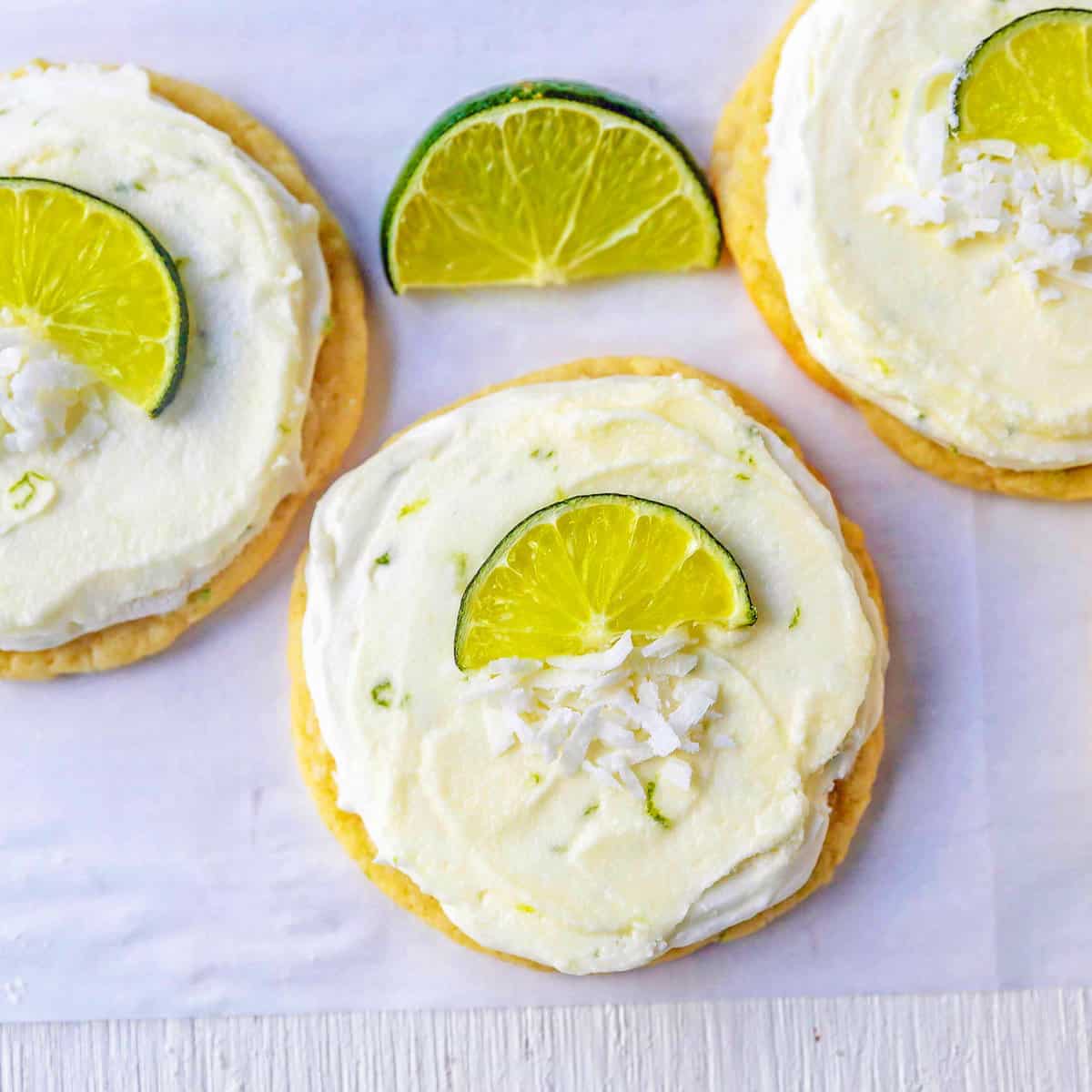 Chewy lime cookies with creamy coconut lime frosting. This frosted lime sugar cookie will be a favorite in the summer. The perfect tropical Caribbean cookie!