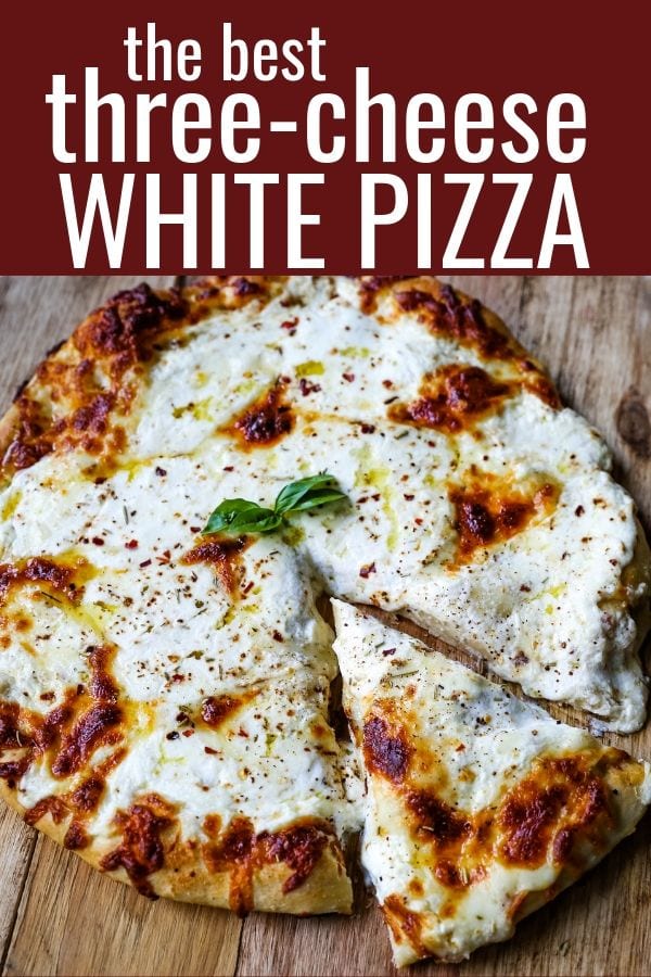 The Best 3-Cheese White Pizza A New-York Style white pizza with drizzled olive oil, mozzarella, parmesan, and ricotta cheese with Italian herbs. www.modernhoney.com #pizzabianca #whitepizza #pizza