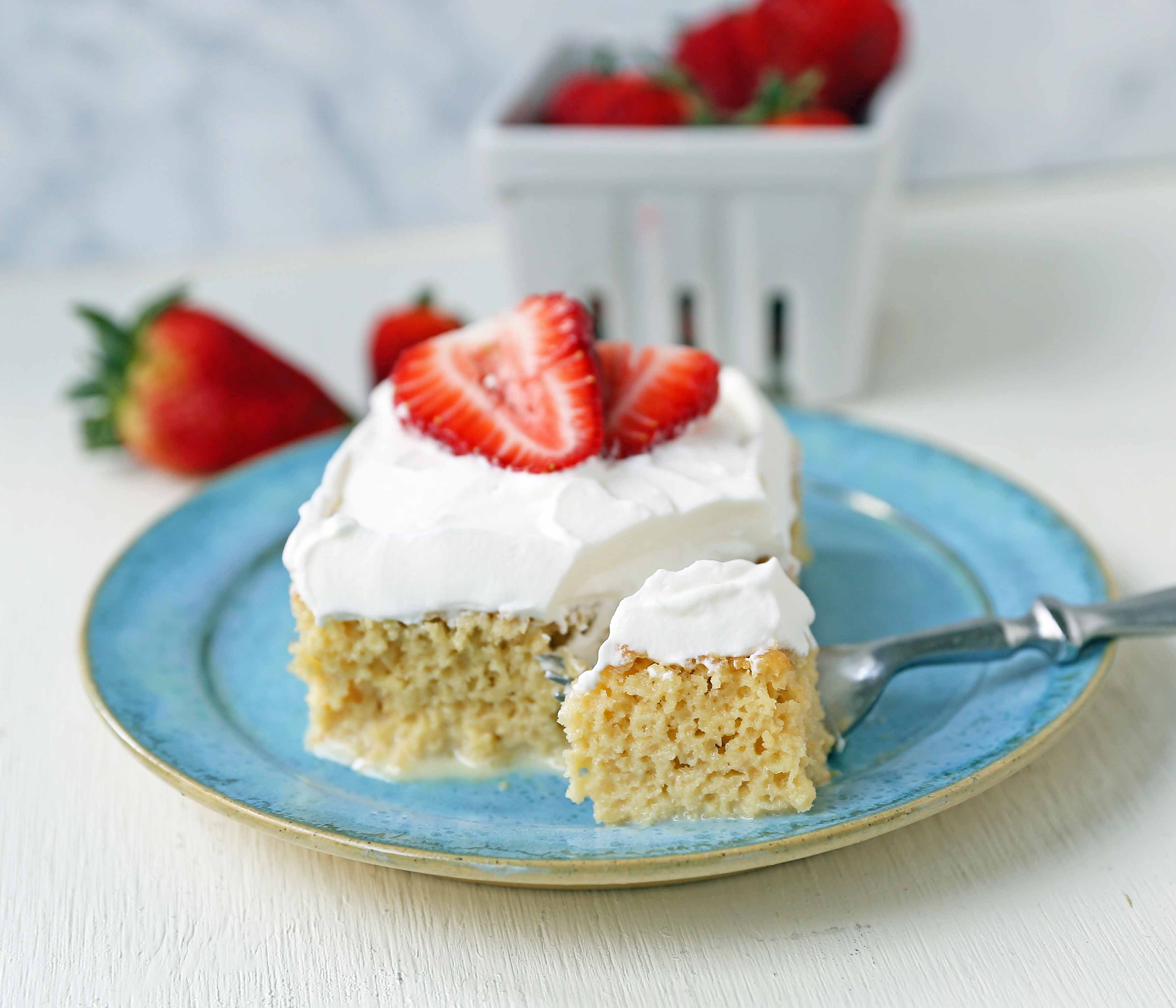 Tres Leches Cake. A classic Mexican dessert made with a vanilla sponge cake soaked with three kinds of milk -- heavy cream, evaporated milk and sweetened condensed milk and topped with whipped cream.  www.modernhoney.com #treslechescake #threemilkcake #cincodemayo 
