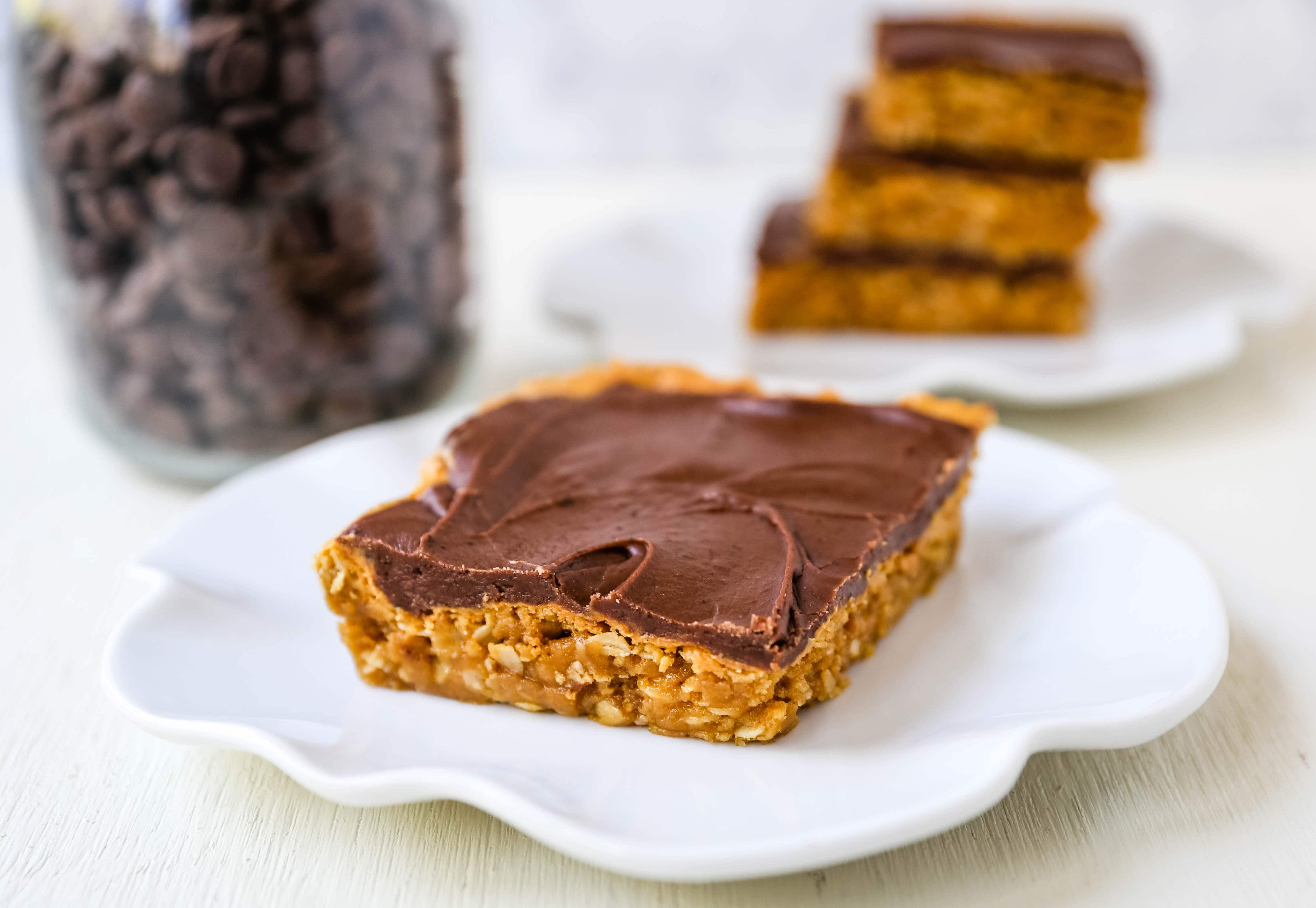 Chocolate Peanut Butter Cookie Bars Peanut Butter Oatmeal Cookie Bars with a Creamy Chocolate Frosting. A chocolate peanut butter lover's dream! Peanut Butter Fingers Recipe. www.modernhoney.com #chocolatepeanutbutter #peanutbutterbars #dessertbars