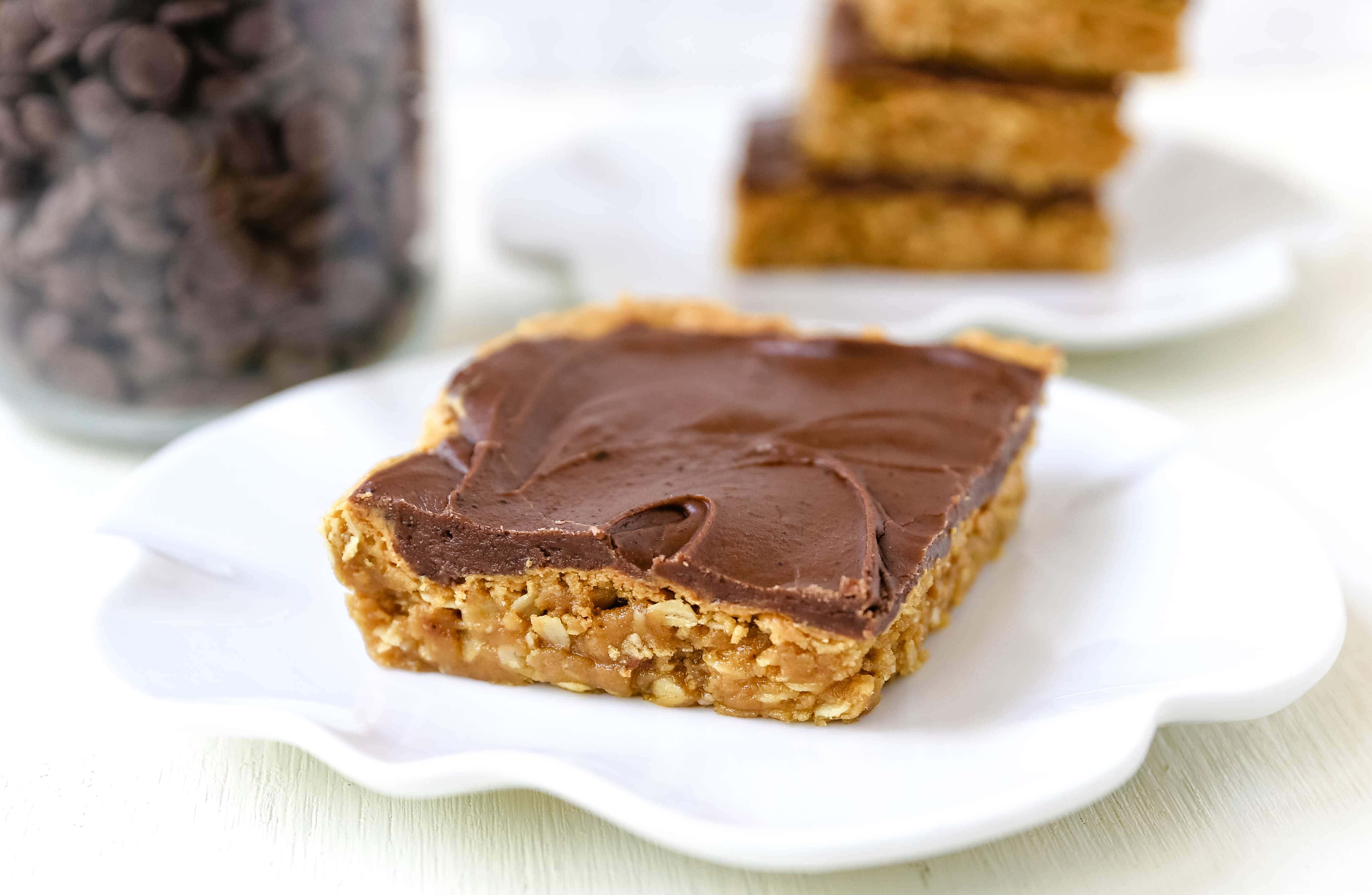 Chocolate Peanut Butter Cookie Bars Peanut Butter Oatmeal Cookie Bars with a Creamy Chocolate Frosting. A chocolate peanut butter lover's dream! Peanut Butter Fingers Recipe. www.modernhoney.com #chocolatepeanutbutter #peanutbutterbars #dessertbars