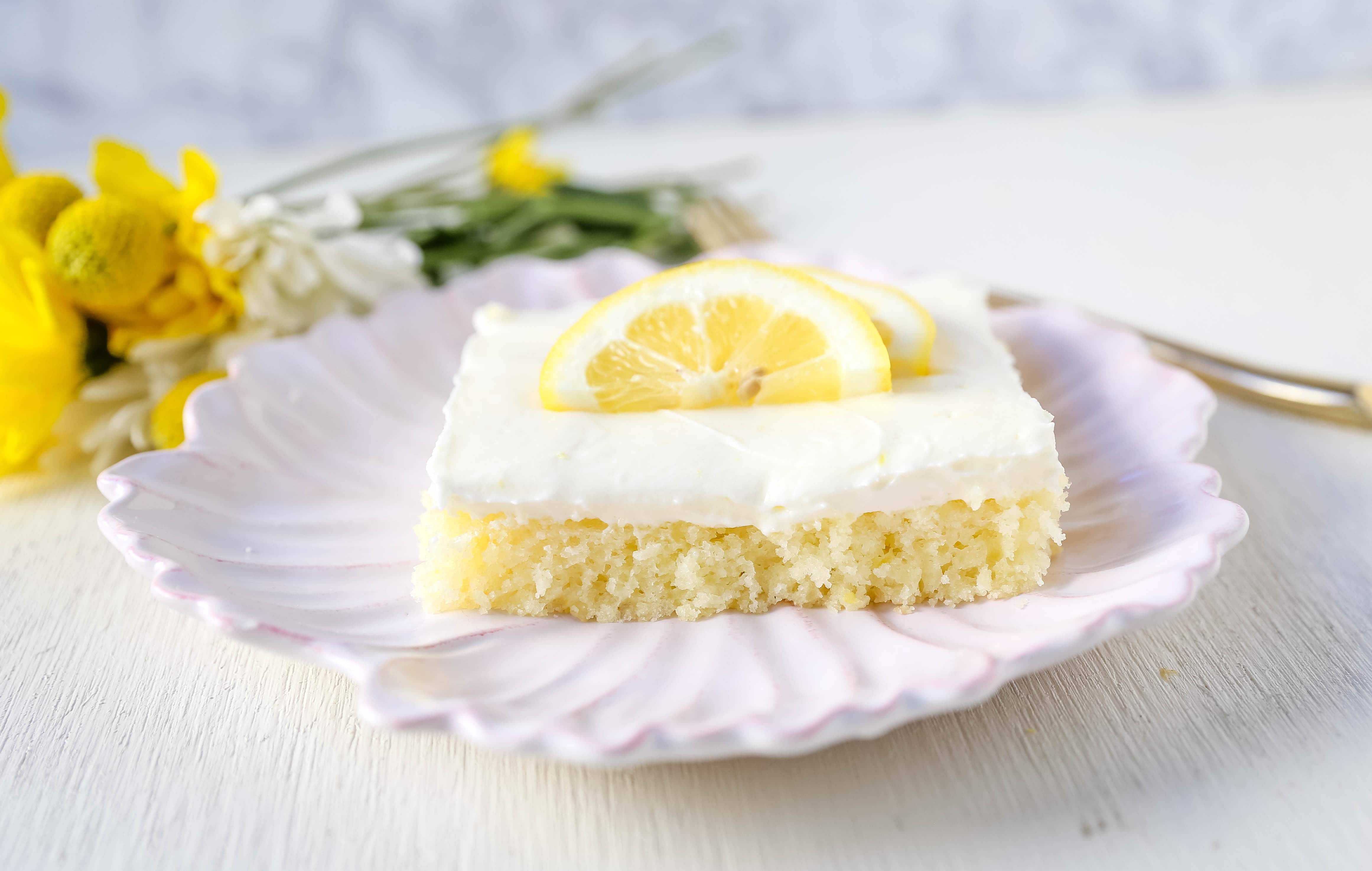 Lemon Sheet Cake Recipe. Moist sour cream lemon sheet cake recipe with a fresh lemon cream cheese frosting. #lemonsheetcake #cake