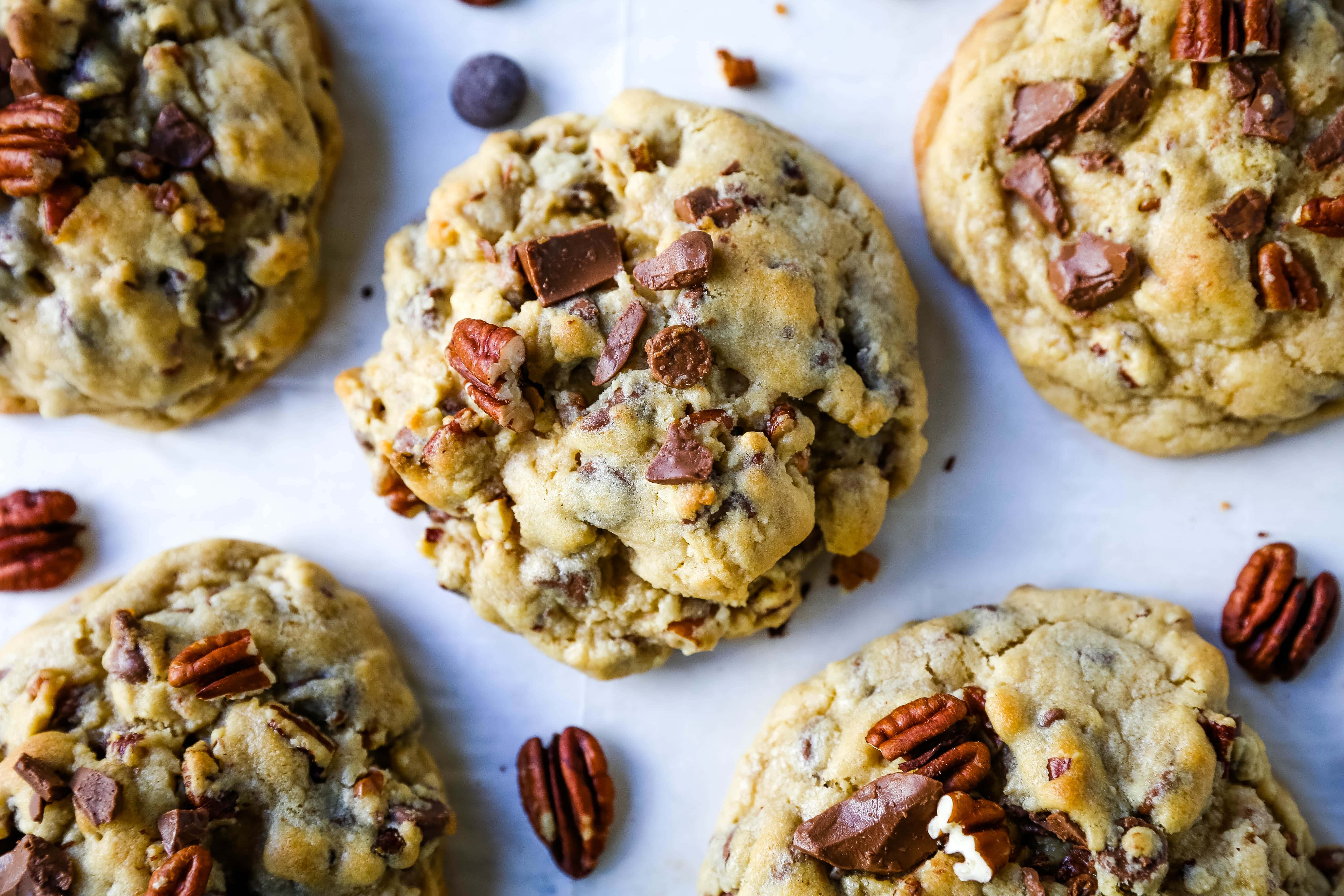 Bakery-Style Milk Chocolate Pecan Cookies. The best chocolate chip pecan cookie recipe. How to make perfect bakery style chocolate chip cookies. X-large cookie recipe. www.modernhoney.com