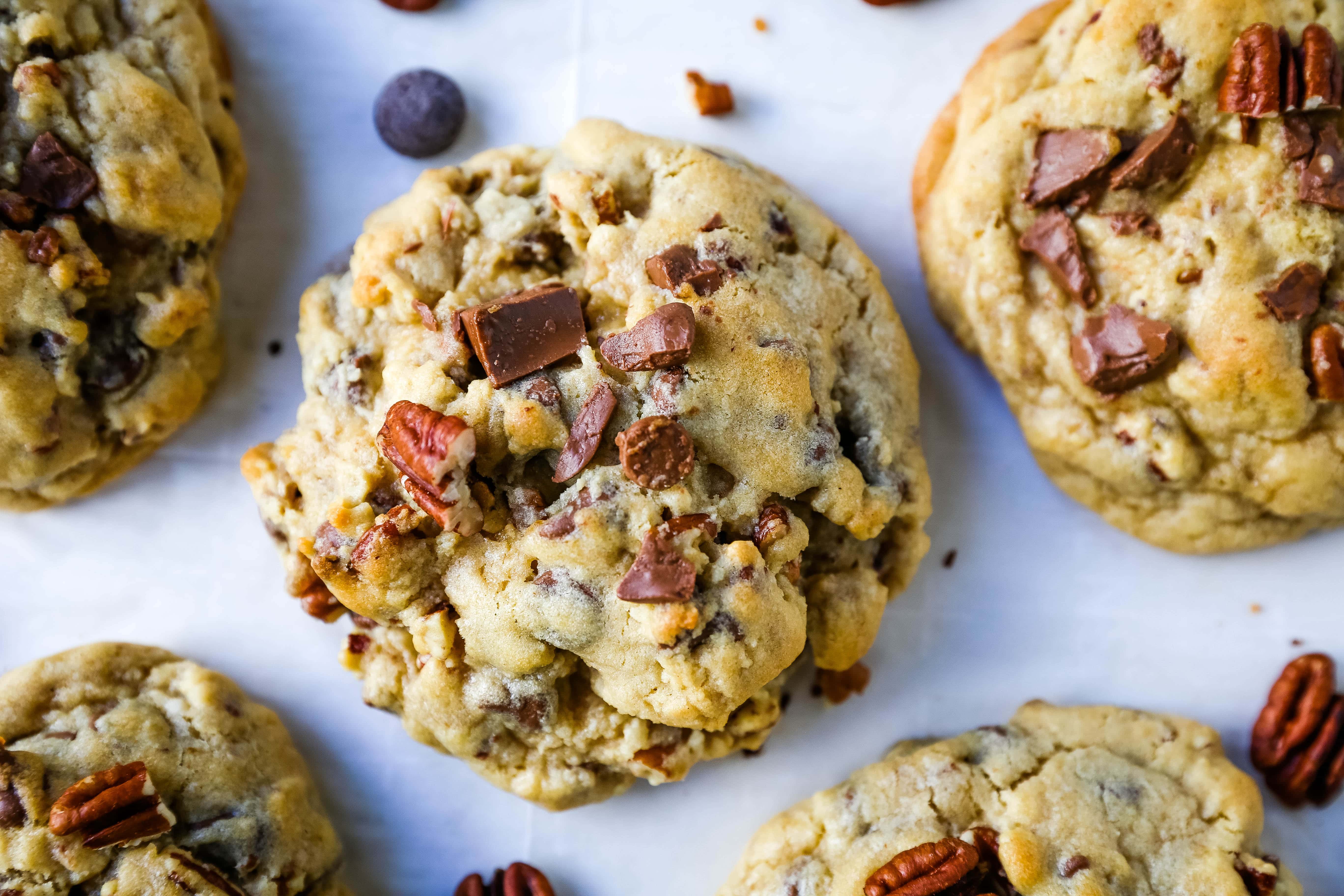 Bakery-Style Milk Chocolate Pecan Cookies. The best chocolate chip pecan cookie recipe. How to make perfect bakery style chocolate chip cookies. X-large cookie recipe. www.modernhoney.com