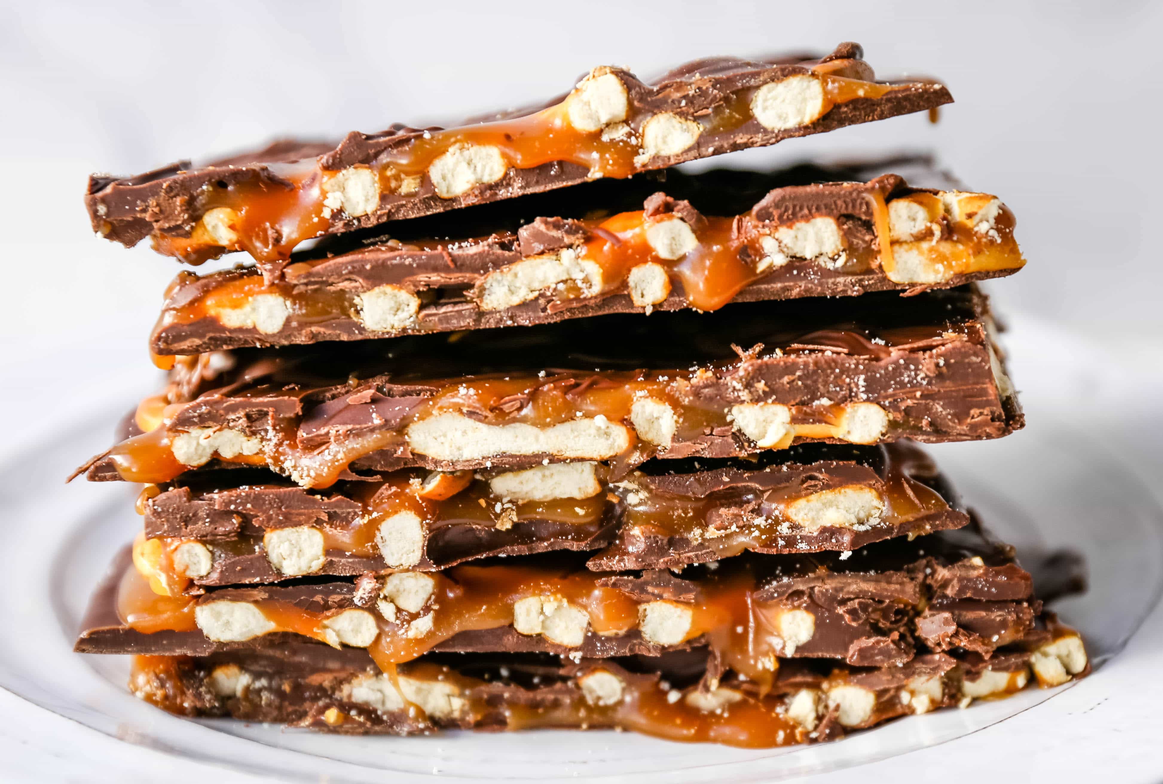 Chocolate Caramel Pretzel Bark. An easy homemade chocolate candy treat made with homemade salted caramel, salty pretzels, and creamy milk and semi-sweet chocolate. The perfect salty sweet combination! www.modernhoney.com #chocolatebark #pretzelbark #chocolatepretzelbark