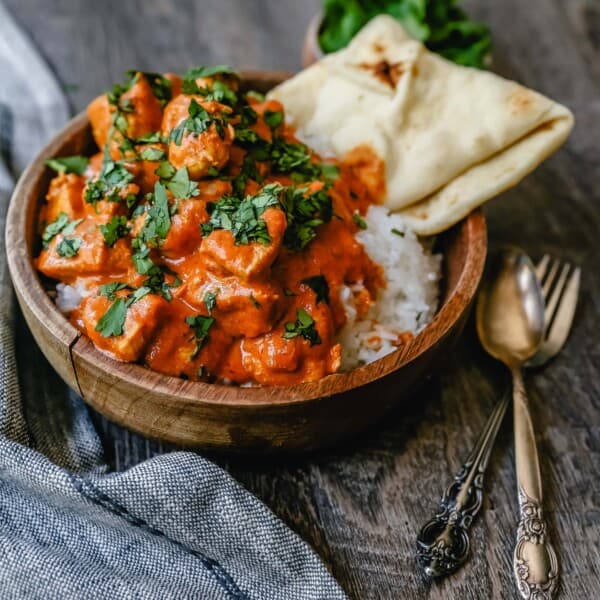 Indian Butter Chicken A popular Indian dish made with tender chicken simmered in a rich, Indian spiced tomato cream sauce. The Best Indian Butter Chicken Recipe! #indianfood #butterchicken