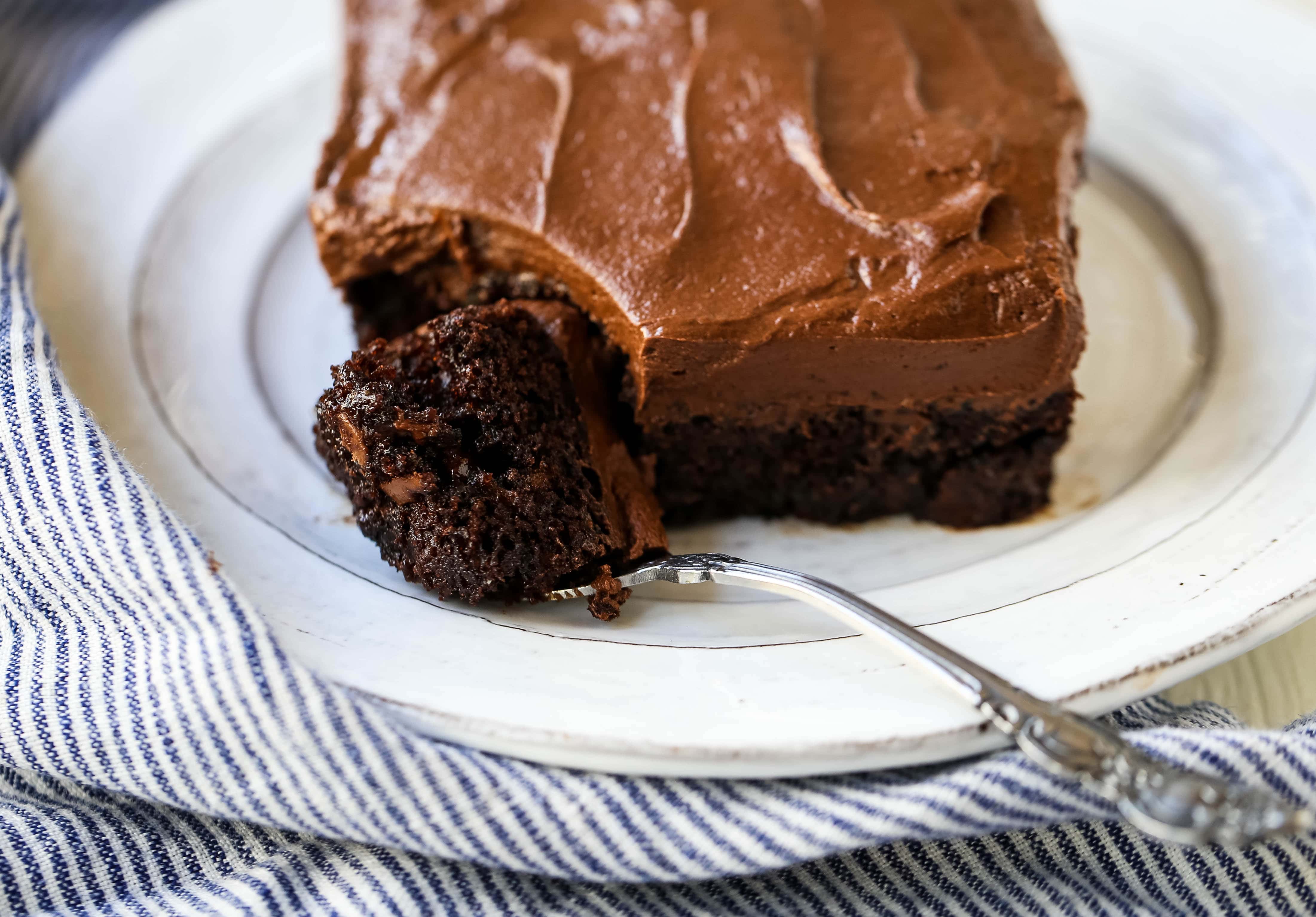 Chocolate Zucchini Cake Moist chocolate cake with grated zucchini with a rich chocolate buttercream frosting. You can't even taste the zucchini so this is definitely the best way to eat your vegetables! The Best Chocolate Zucchini Cake Recipe. www.modernhoney.com #zucchinicake #chocolatezucchinicake