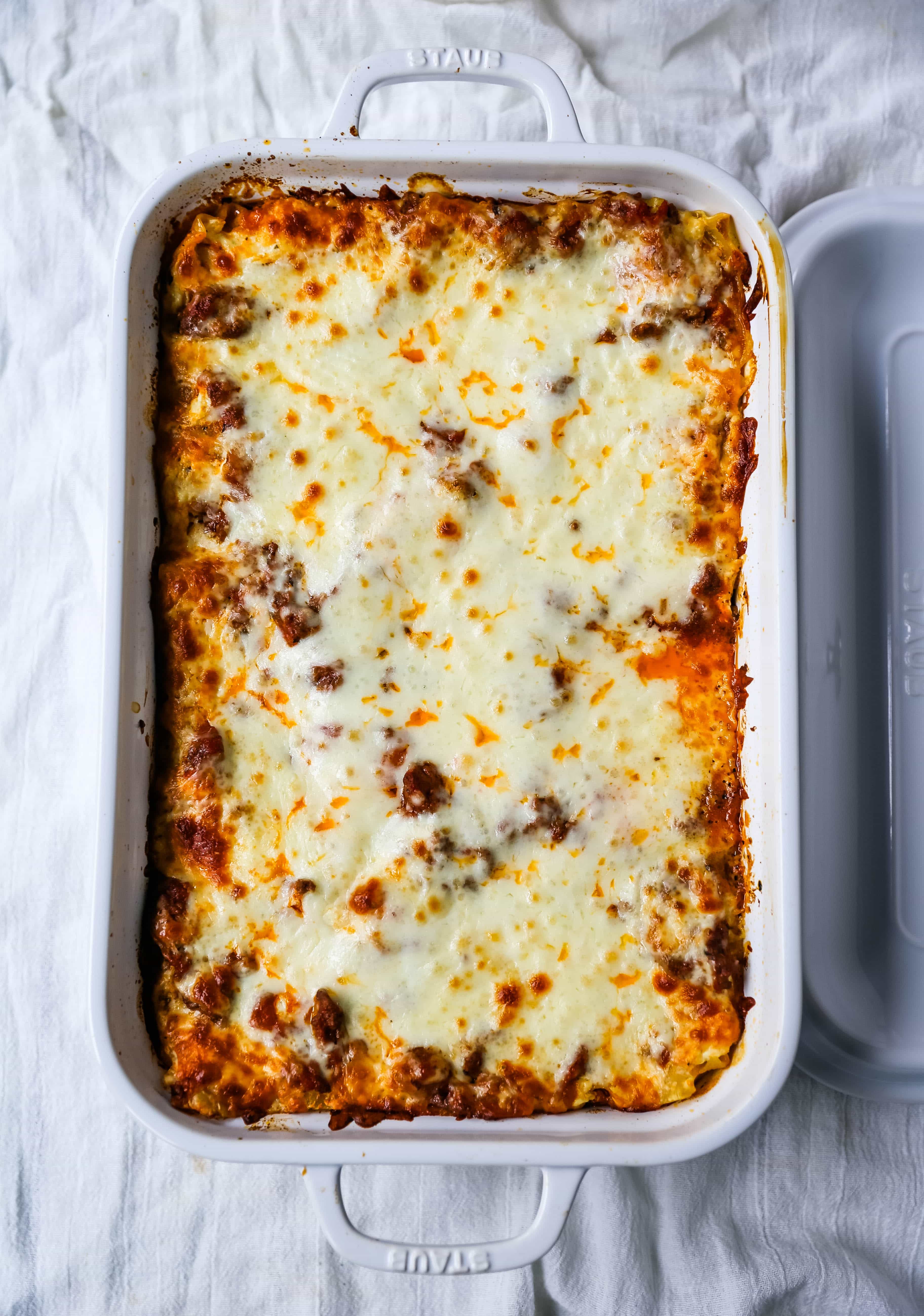 Classic Lasagna Recipe The perfect lasagna recipe made with parmesan ricotta cheese filling, melted mozzarella cheese, lasagna noodles, and a robust tomato meat sauce. It is the best lasagna recipe!