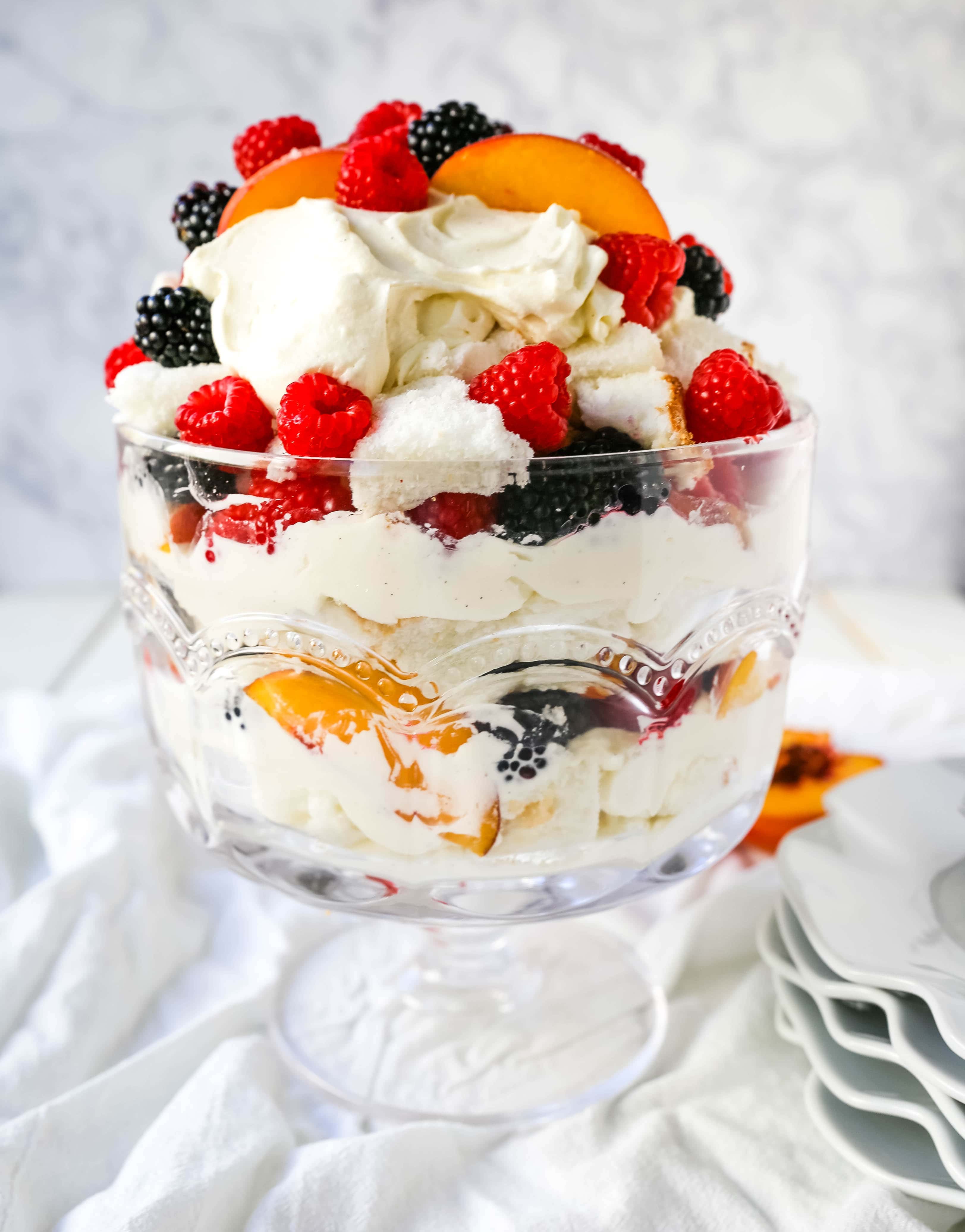 Peach Berry Trifle Angel food cake, a sweet, creamy, fluffy filling with fresh peaches and raspberries makes this the perfect summer dessert.  www.modernhoney.com #peach #peacherecipes #trifle #dessert