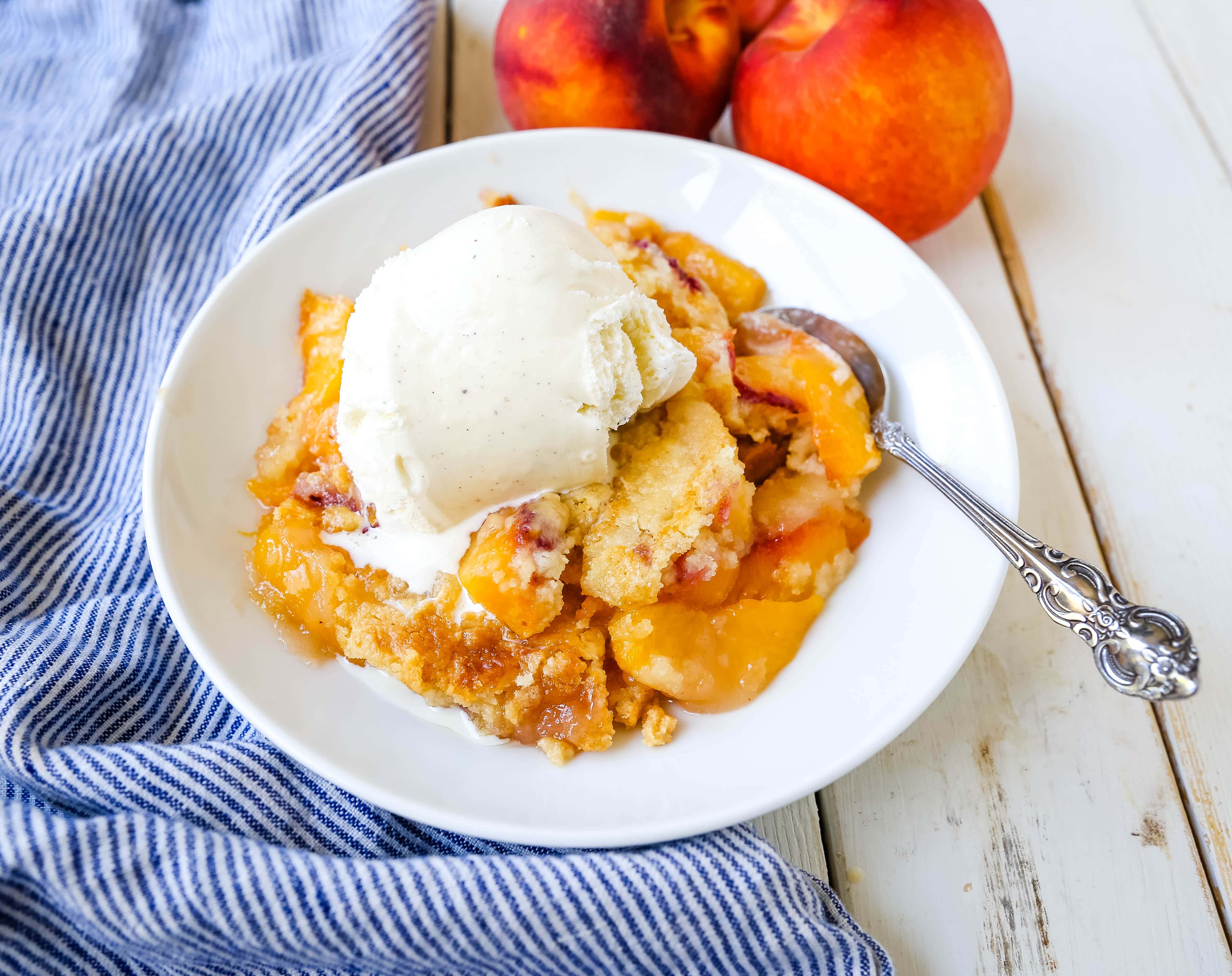 Peach Dump Cake The easiest 4-ingredient peach dessert. Fresh peaches, a touch of sugar, French vanilla cake mix, and butter all baked until golden and topped with vanilla ice cream. The simplest peach cobbler dessert recipe! www.modernhoney.com #peach #peaches #peachdesserts #peachcobbler #peachdumpcake