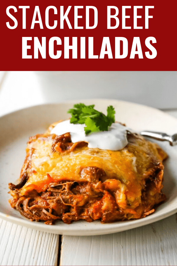 Stacked Beef Enchiladas. Mexican seasoned shredded beef enchiladas with melted cheese, corn tortillas, and homemade enchilada sauce. An easy beef enchilada casserole! #mexican #mexicanfood #enchiladas #beefenchiladas