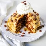 Chocolate Chip Pancakes The Best Homemade light, fluffy buttermilk pancakes with sweet milk chocolate chips. It makes the most decadent breakfast! www.modernhoney.com #pancakes #chocolatechippancakes #chocolatepancakes