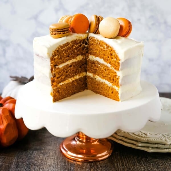 Pumpkin Cake with Cream Cheese Frosting Moist Pumpkin Spiced Cake with a Sweet Cream Cheese Frosting. The best Fall pumpkin layered cake recipe!  www.modernhoney.com #pumpkin #pumpkinrecipes #fall #ffallrecipes #pumpkincake