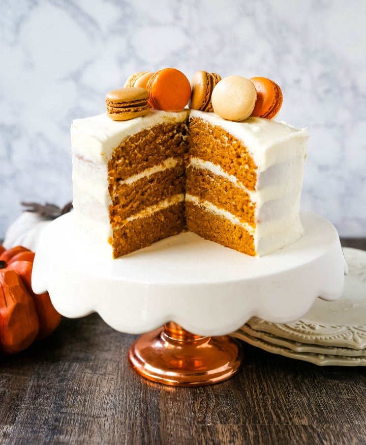 Pumpkin Cake with Cream Cheese Frosting Moist Pumpkin Spiced Cake with a Sweet Cream Cheese Frosting. The best Fall pumpkin layered cake recipe!  www.modernhoney.com #pumpkin #pumpkinrecipes #fall #ffallrecipes #pumpkincake