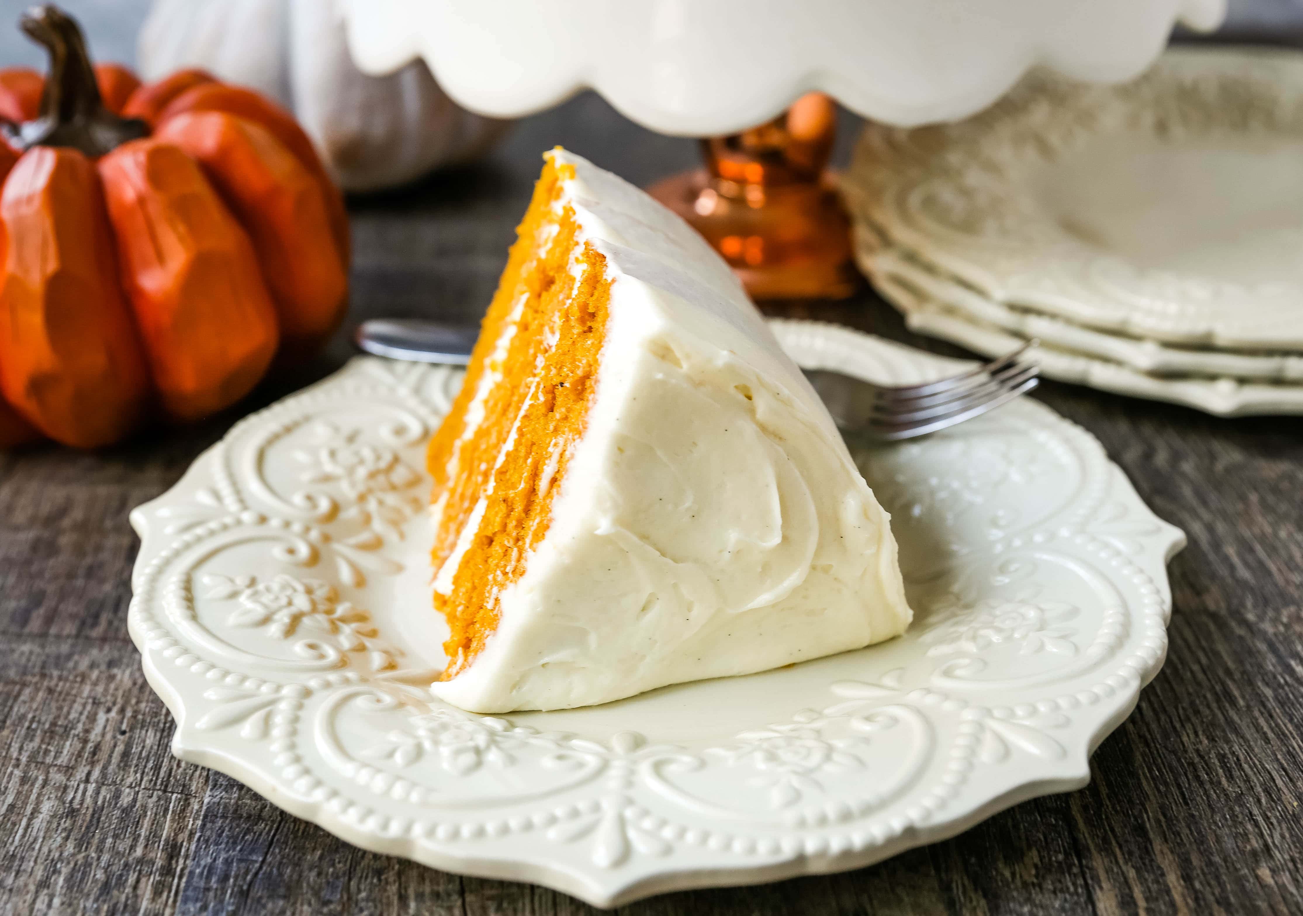 Pumpkin Cake with Cream Cheese Frosting Moist Pumpkin Spiced Cake with a Sweet Cream Cheese Frosting. The best Fall pumpkin layered cake recipe!  www.modernhoney.com #pumpkin #pumpkinrecipes #fall #ffallrecipes #pumpkincake
