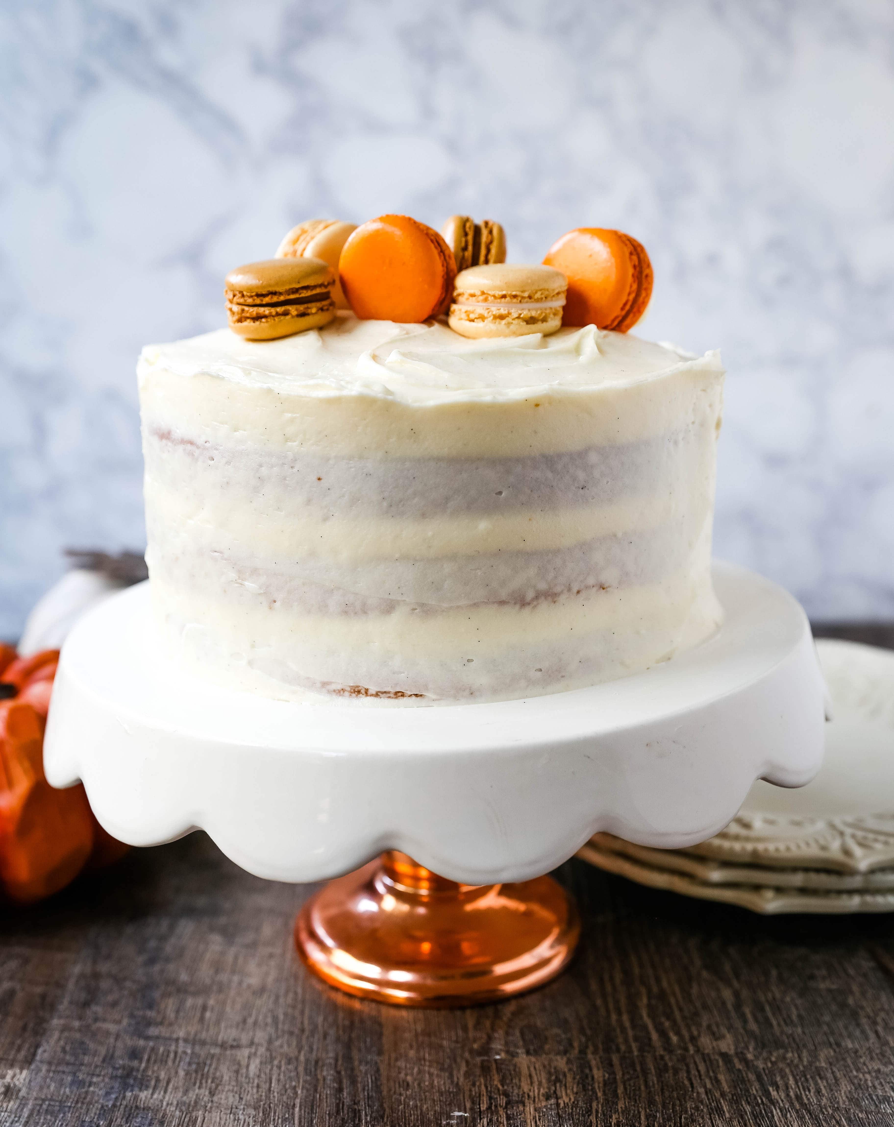 Pumpkin Cake with Cream Cheese Frosting Moist Pumpkin Spiced Cake with a Sweet Cream Cheese Frosting. The best Fall pumpkin layered cake recipe!  www.modernhoney.com #pumpkin #pumpkinrecipes #fall #ffallrecipes #pumpkincake