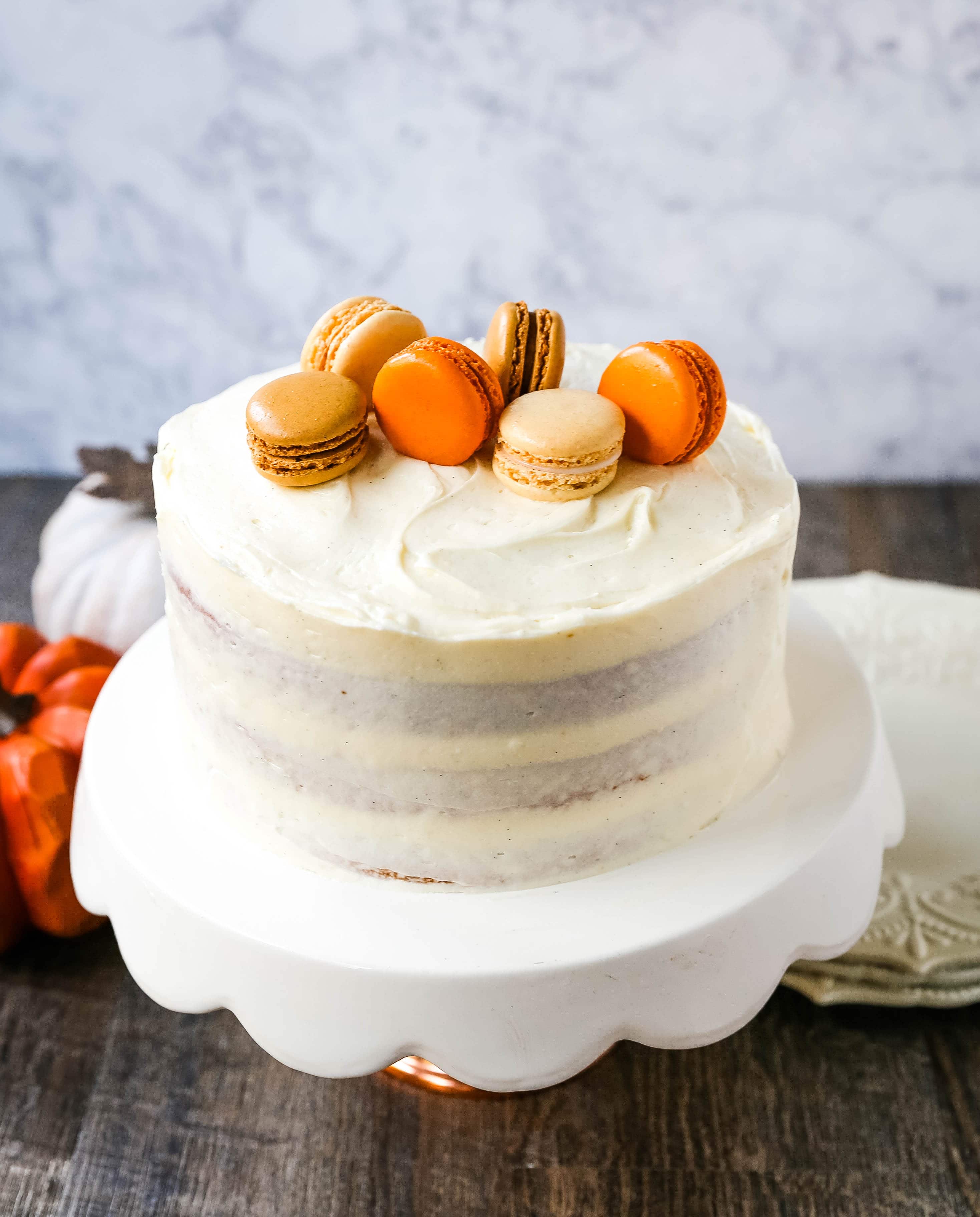 Pumpkin Cake with Cream Cheese Frosting Moist Pumpkin Spiced Cake with a Sweet Cream Cheese Frosting. The best Fall pumpkin layered cake recipe!  www.modernhoney.com #pumpkin #pumpkinrecipes #fall #ffallrecipes #pumpkincake