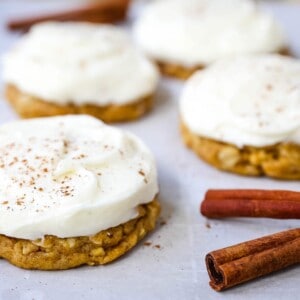 The BEST PUMPKIN COOKIES with CREAM CHEESE FROSTING Soft chewy pumpkin spiced cookies with a fluffy sweet cream cheese frosting. The perfect frosted pumpkin cookie recipe! www.modernhoney.com #pumpkin #pumpkincookies #frostedpumpkincookies #fall #fallrecipes