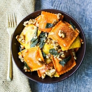 Ravioli with Browned Butter and Sage Fresh ravioli tossed in a browned butter sauce with crispy sage and toasted walnuts. A bowl of rich, creamy comfort food! www.modernhoney.com #ravioli #pasta #pumpkinravioli