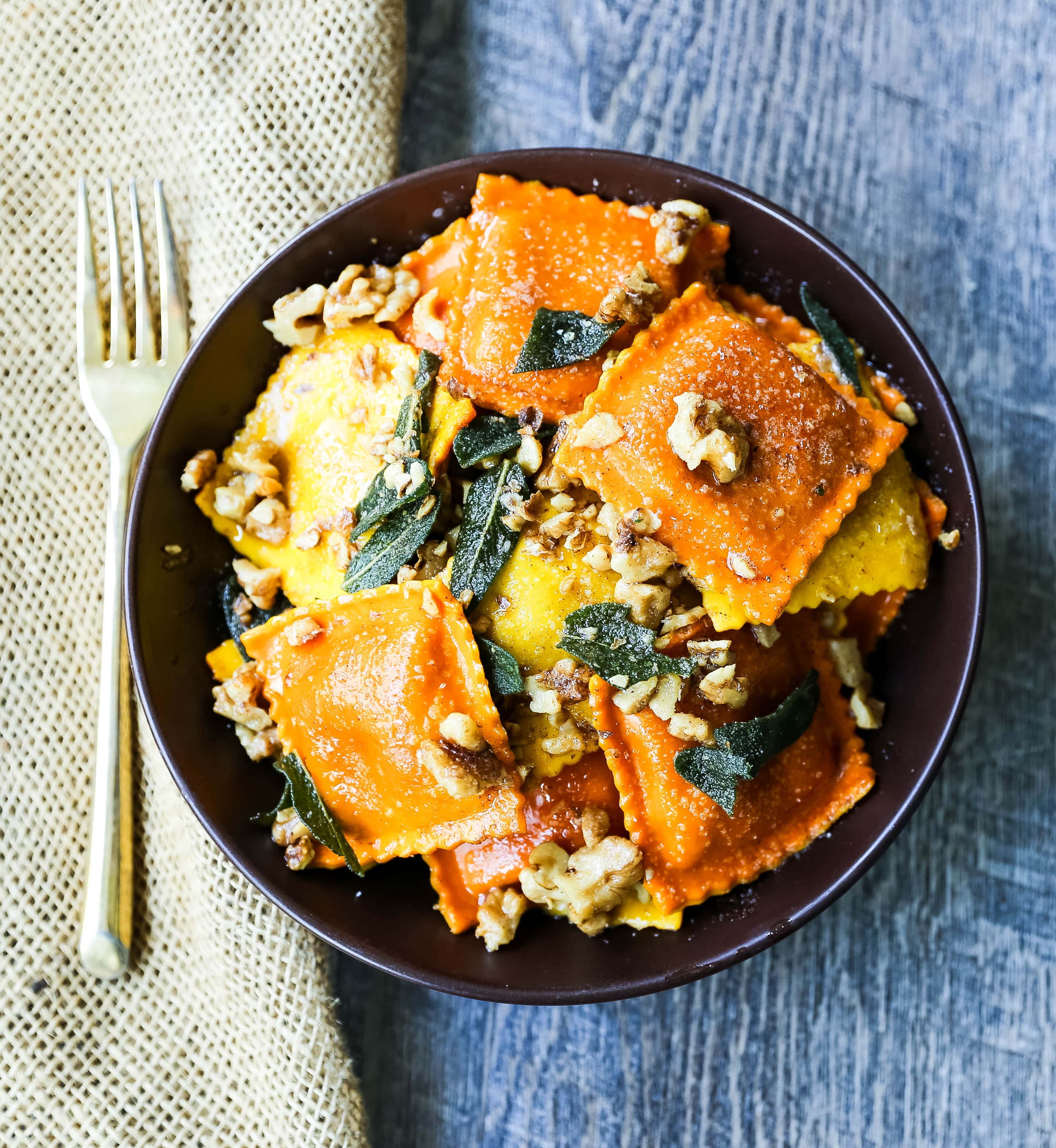 Ravioli with Browned Butter and Sage Fresh ravioli tossed in a browned butter sauce with crispy sage and toasted walnuts. A bowl of rich, creamy comfort food! www.modernhoney.com #ravioli #pasta #pumpkinravioli