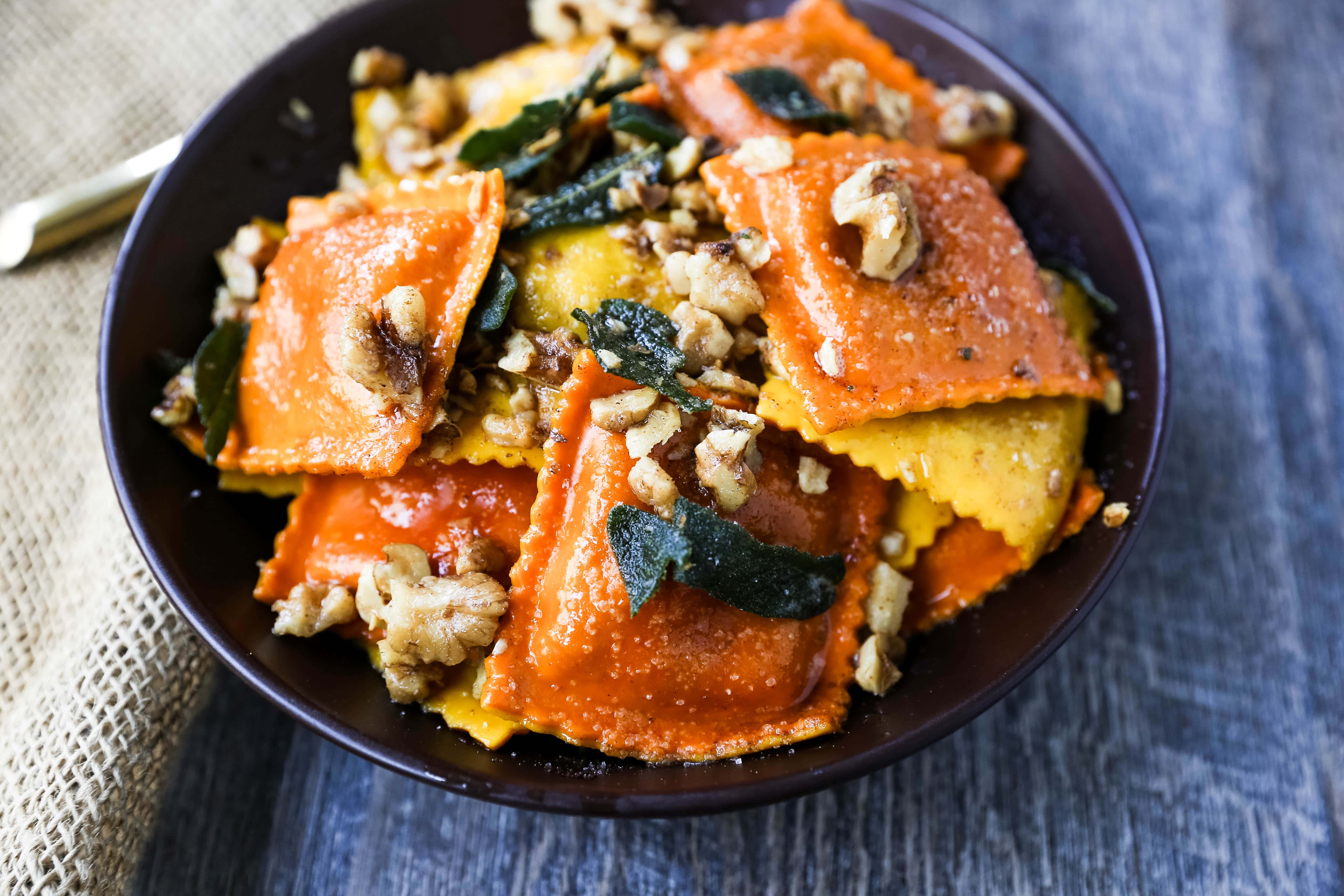 Ravioli with Browned Butter and Sage Fresh ravioli tossed in a browned butter sauce with crispy sage and toasted walnuts. A bowl of rich, creamy comfort food! www.modernhoney.com #ravioli #pasta #pumpkinravioli