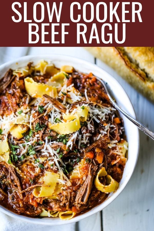 Sunday Slow Cooker Beef Ragu. Authentic Italian Beef Ragu. The ultimate comfort food! A big bowl of slow cooked, braised beef in a rich, robust tomato sauce tossed with pasta. I guarantee that you will go back for seconds! www.modernhoney.com #slowcooker #beefragu #italianfood #italian