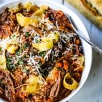 Sunday Slow Cooker Beef Ragu. Authentic Italian Beef Ragu. The ultimate comfort food! A big bowl of slow cooked, braised beef in a rich, robust tomato sauce tossed with pasta. I guarantee that you will go back for seconds! www.modernhoney.com #slowcooker #beefragu #italianfood #italian