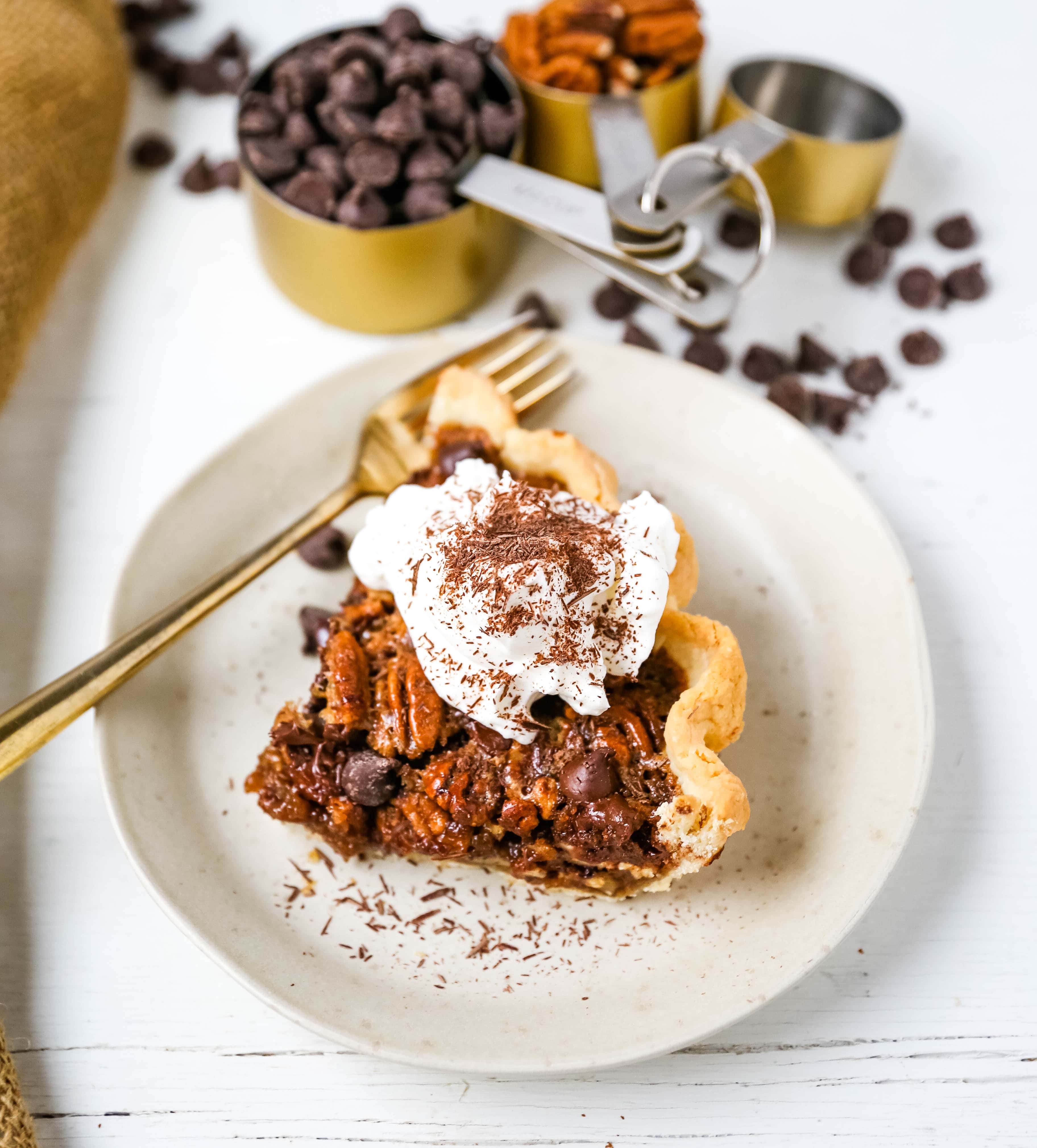 Chocolate Pecan Pie Rich chocolate pecan pie made with a brown sugar filling, crunchy pecans, rich chocolate, all in a homemade buttery, flaky pie crust. www.modernhoney.com #pie #pecanpie #chocolatepecanpie #thanksgiving #pies