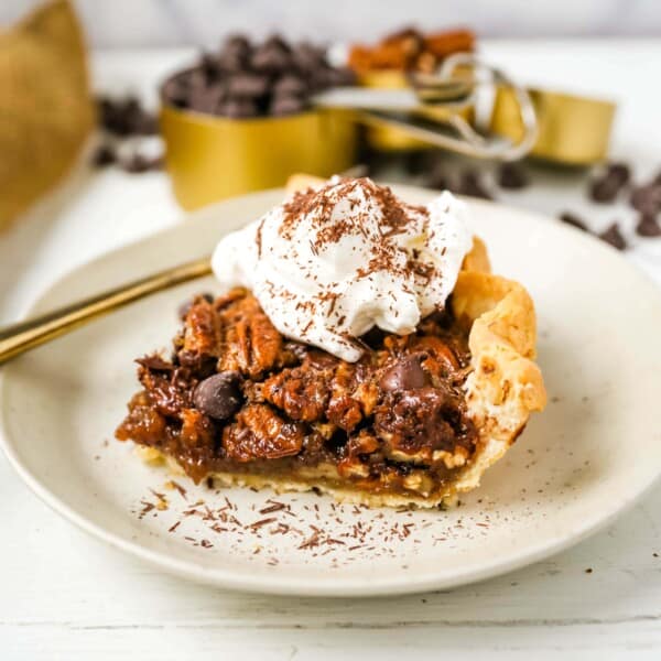 Chocolate Pecan Pie Rich chocolate pecan pie made with a brown sugar filling, crunchy pecans, rich chocolate, all in a homemade buttery, flaky pie crust. www.modernhoney.com #pie #pecanpie #chocolatepecanpie #thanksgiving #pies