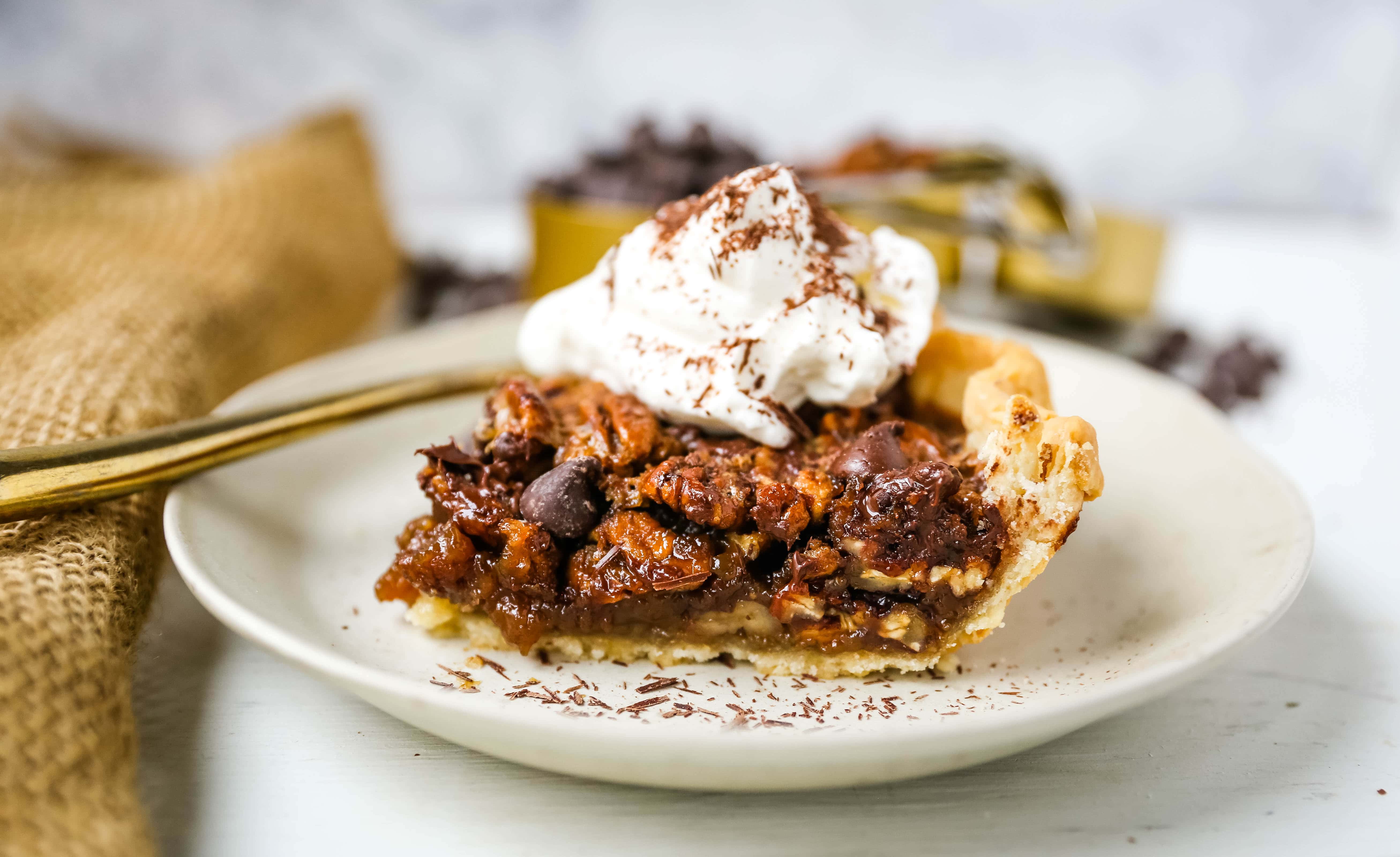 Chocolate Pecan Pie Rich chocolate pecan pie made with a brown sugar filling, crunchy pecans, rich chocolate, all in a homemade buttery, flaky pie crust. www.modernhoney.com #pie #pecanpie #chocolatepecanpie #thanksgiving #pies