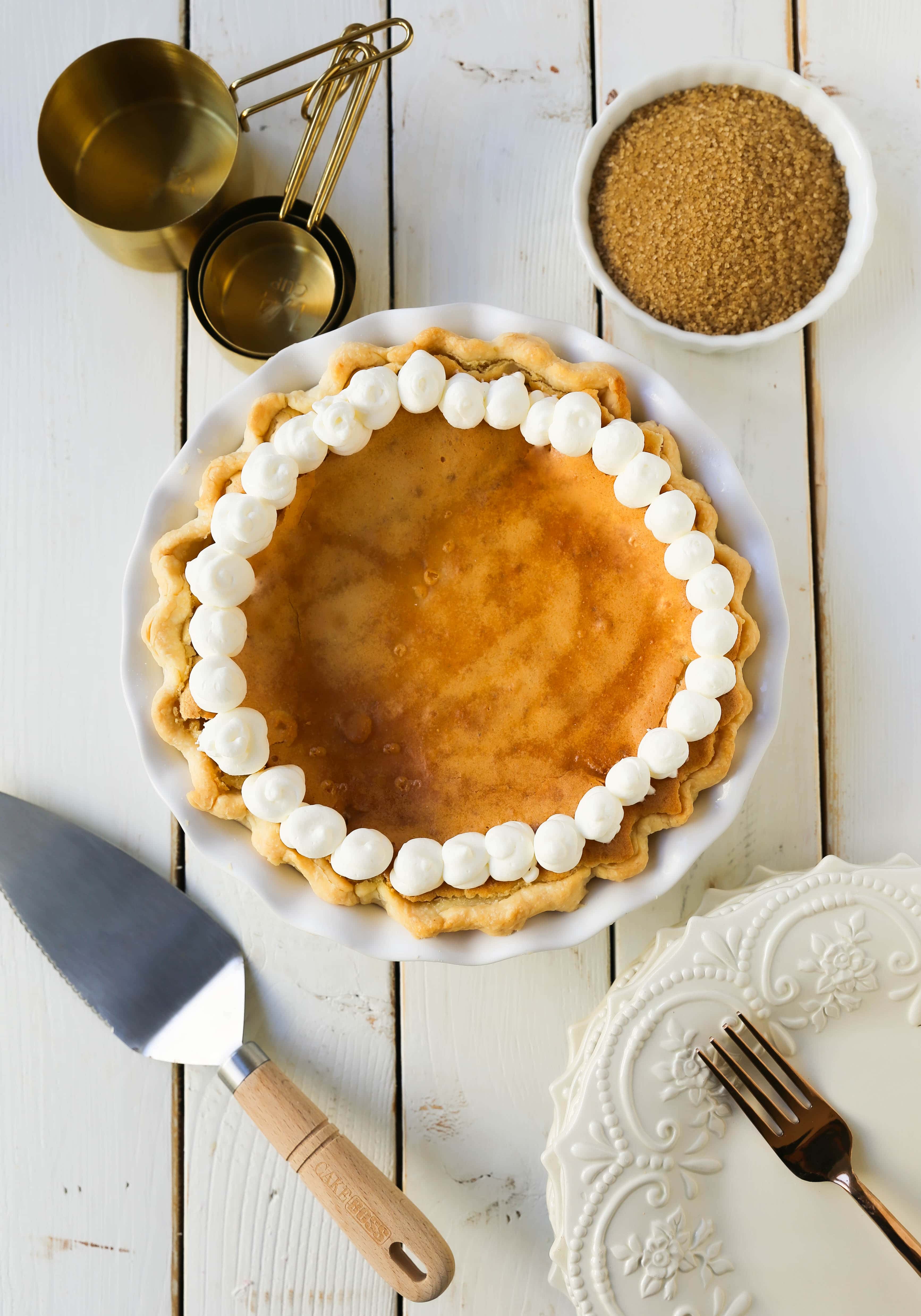 Creme Brûlée Pie. A silky smooth vanilla custard in a buttery crust topped with a crisp sugar topping. It is a creamy sweet pie with a touch of tang and will be everyone's favorite pie! www.modernhoney.com #thanksgiving #pie #pies #thanksgivingrecipes #cremebrulee