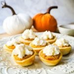 Mini Pumpkin Pie Bites. The best bite-size mini pumpkin pies perfect for entertaining during the holiday season. Creamy pumpkin pie filling in buttery pie crust cups topped with fresh whipped cream.  www.modernhoney.com #pumpkinpie #pumpkinpiebites #minipumpkinpies